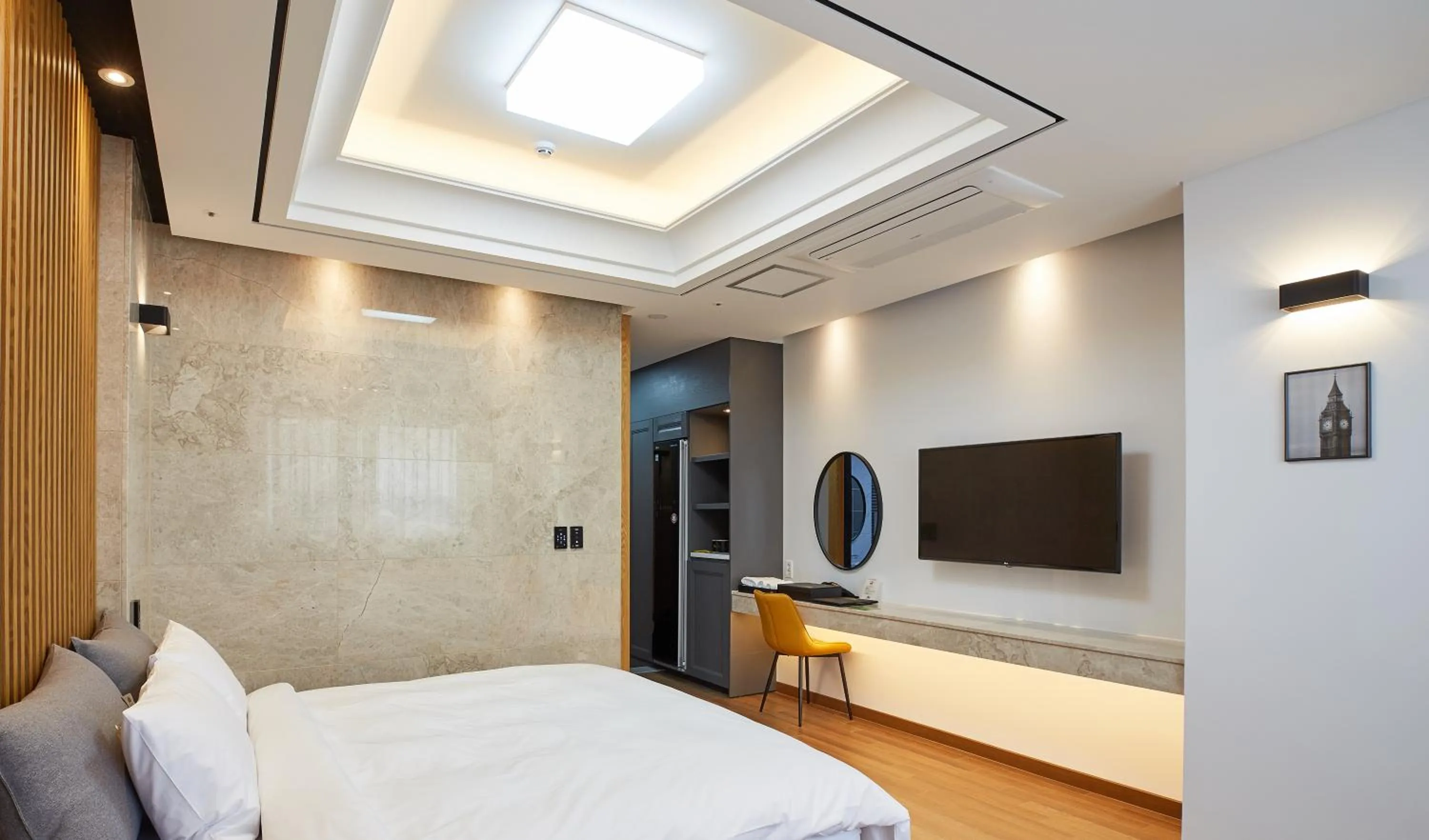 Bed in Noble Stay Hotel