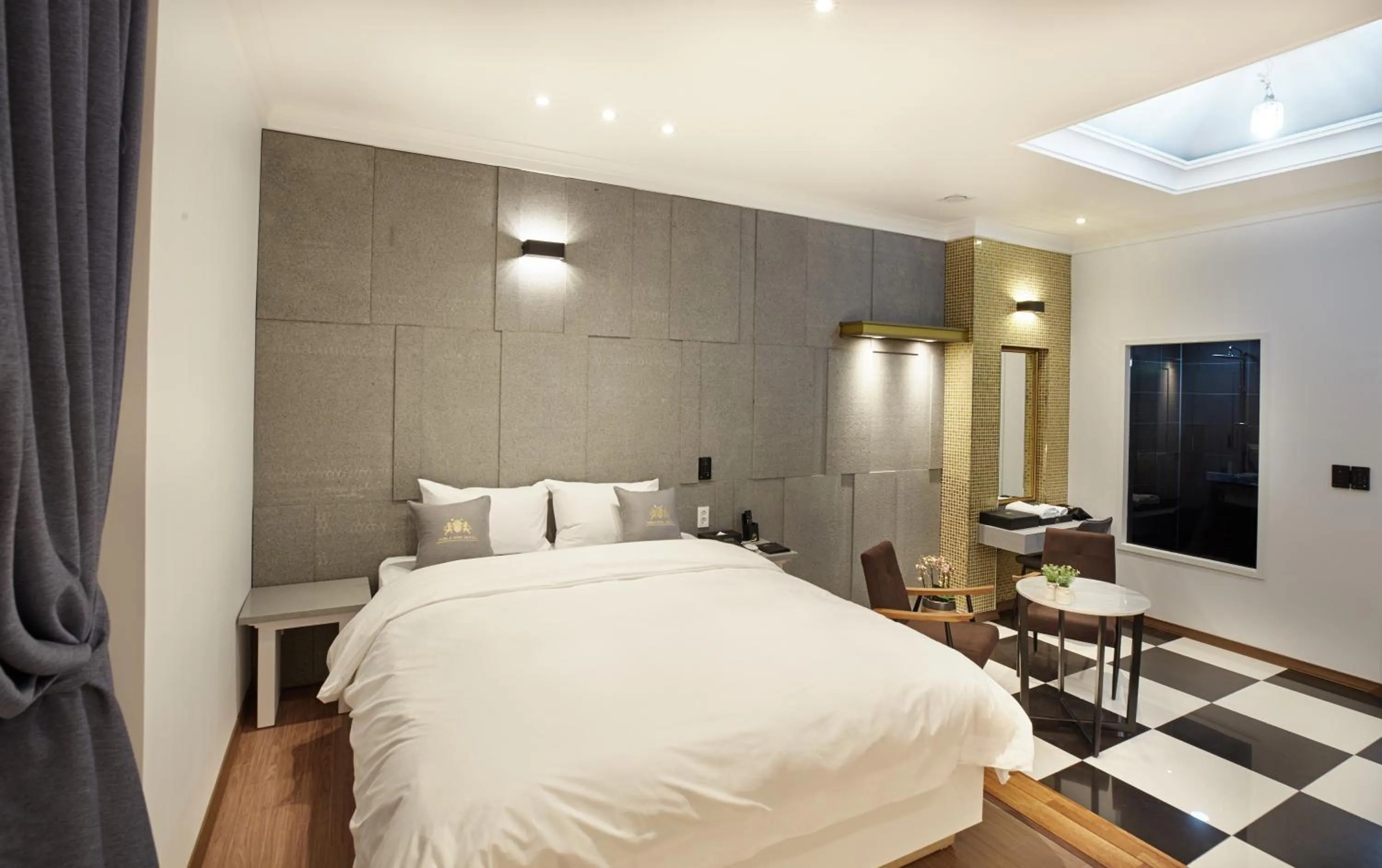 Bed in Noble Stay Hotel