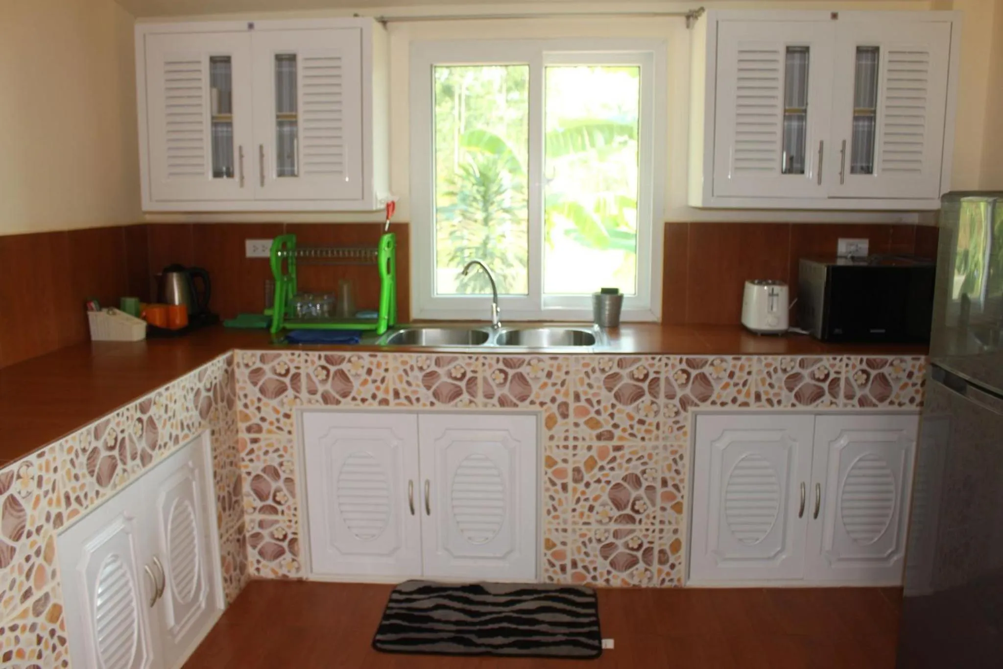 kitchen in 1 bedroom pool Villa Tropical fruit garden Fast Wifi Smart Tv
