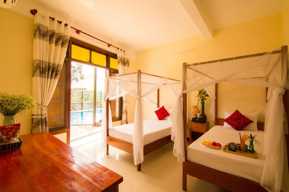 Bed in Phong Nha Lake House Resort