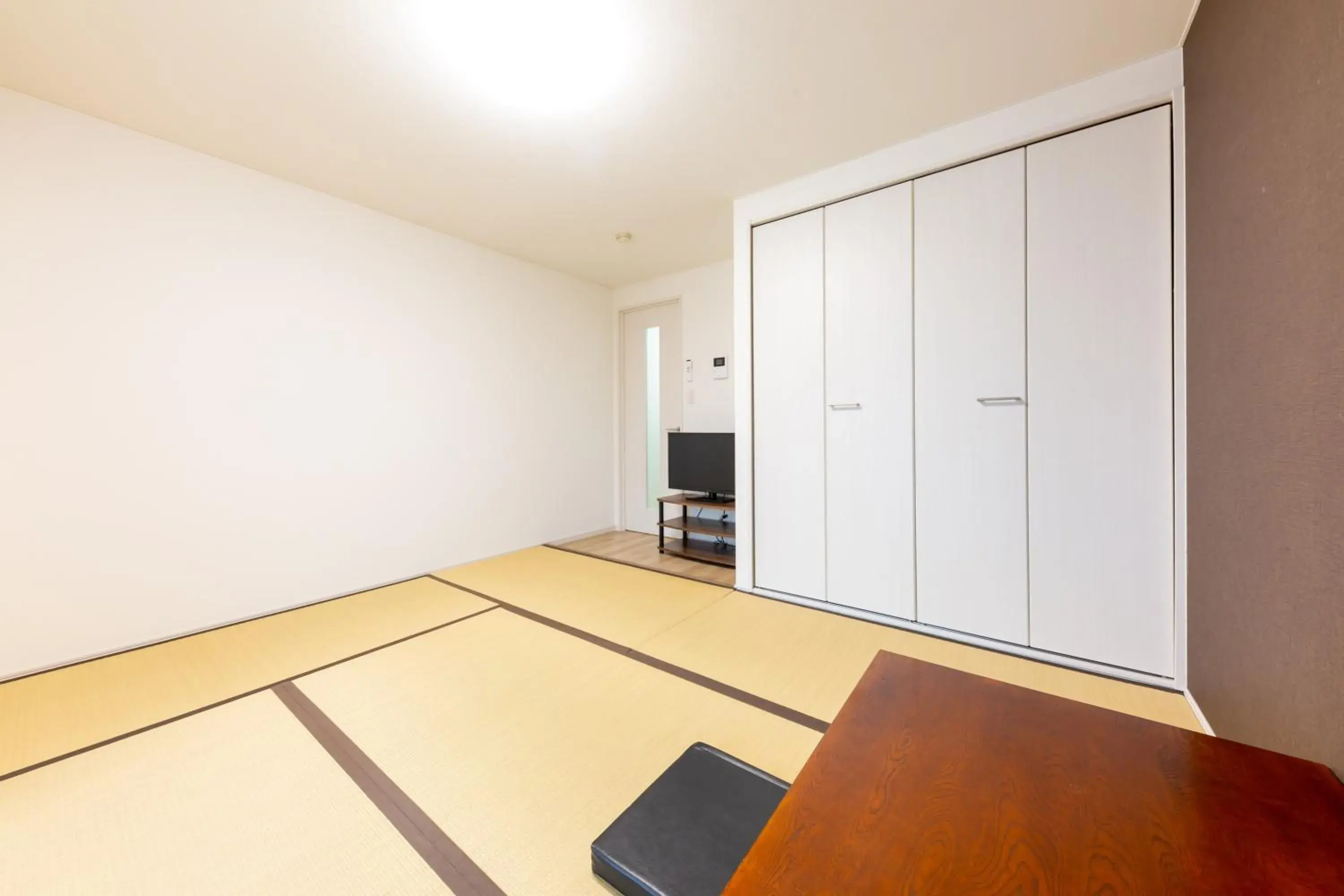 Bed in Tabist Motodai Business Hotel Kanonji Bed in Tabist Motodai Business Hotel Kanonji