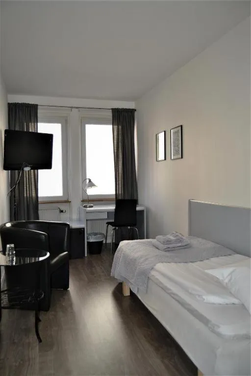 Bed in Green Door Hotel