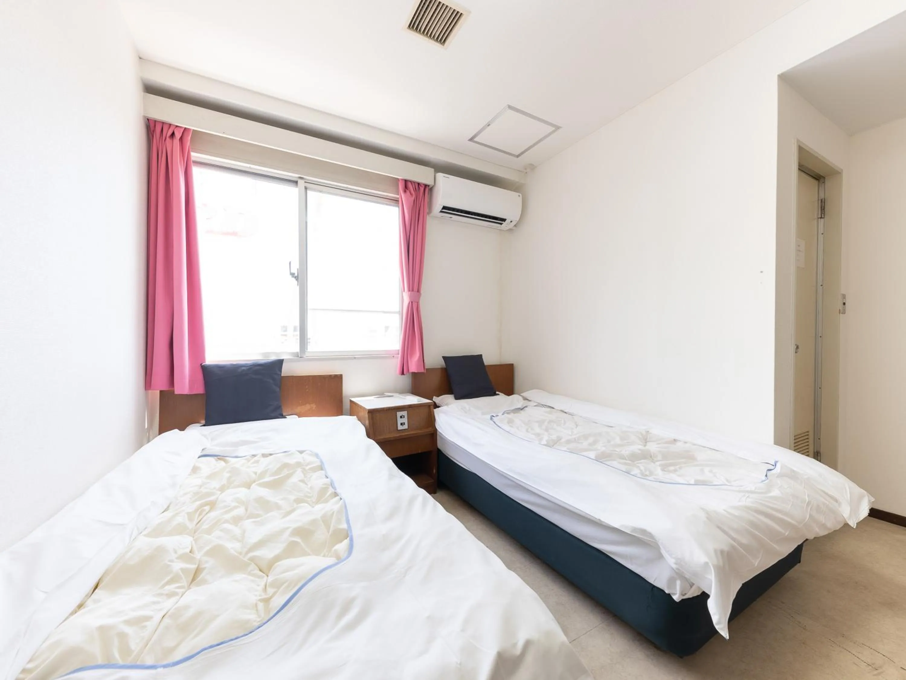 Bed in Tabist Business Hotel Kanazono Gifu