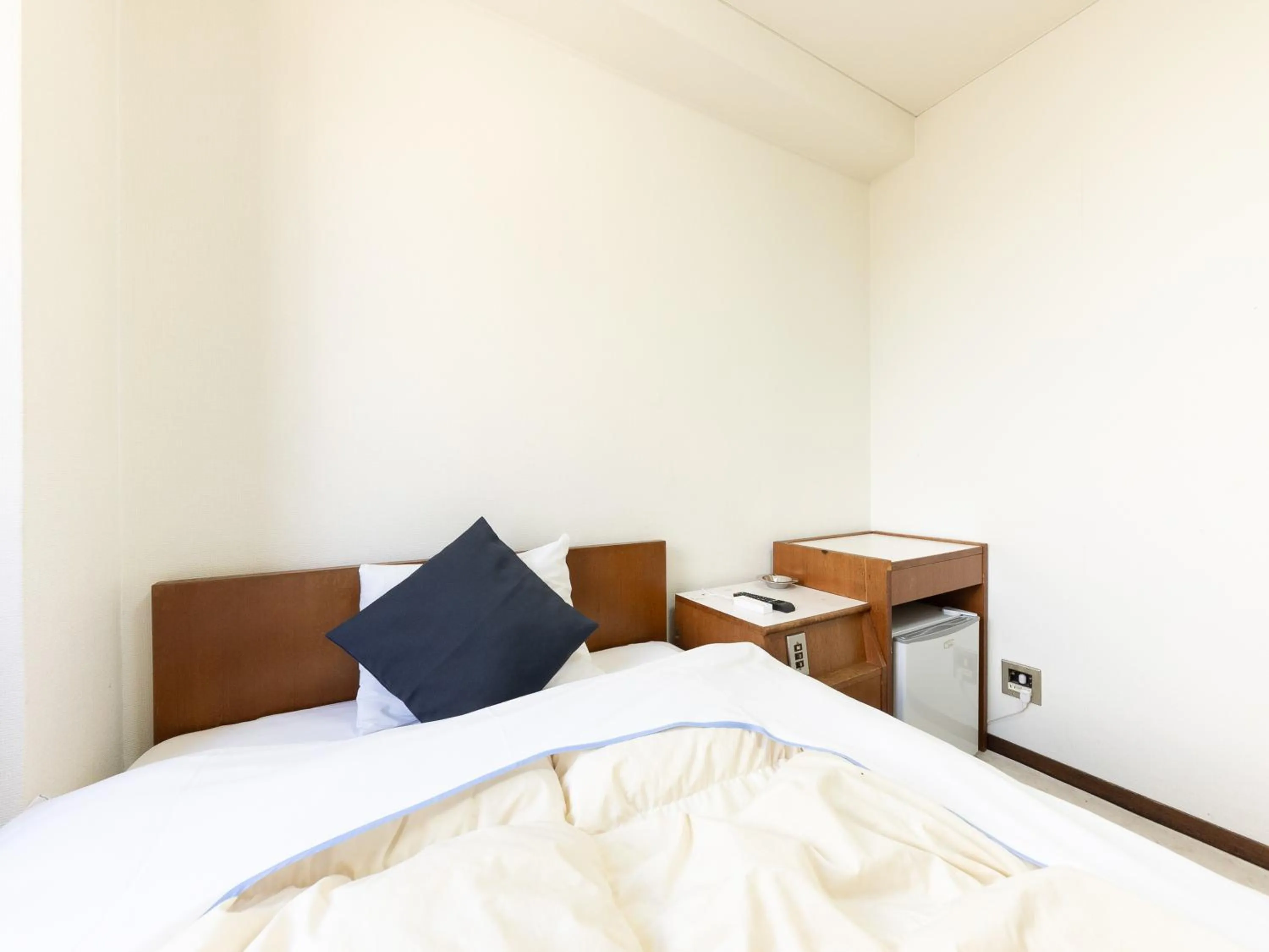 Bed in Tabist Business Hotel Kanazono Gifu