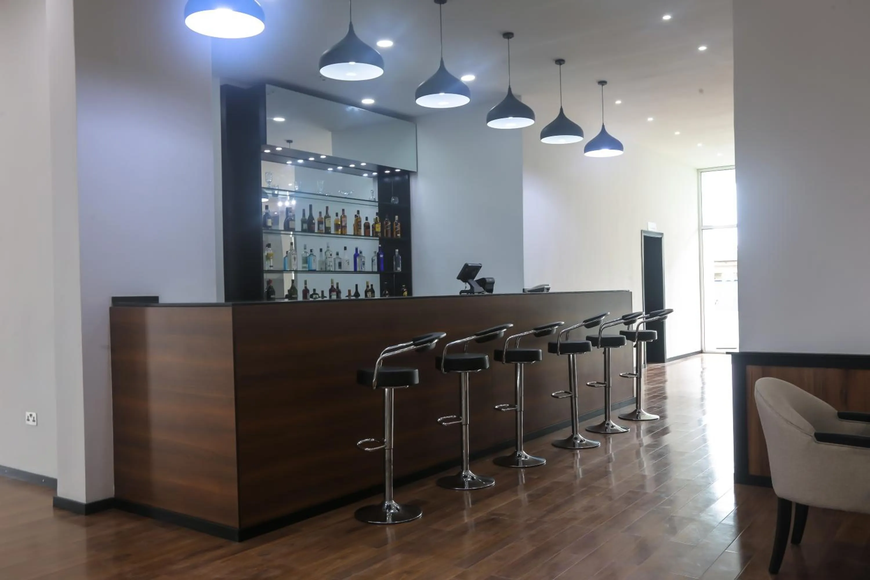 Lounge or bar in BON Hotel Ikeja Residence