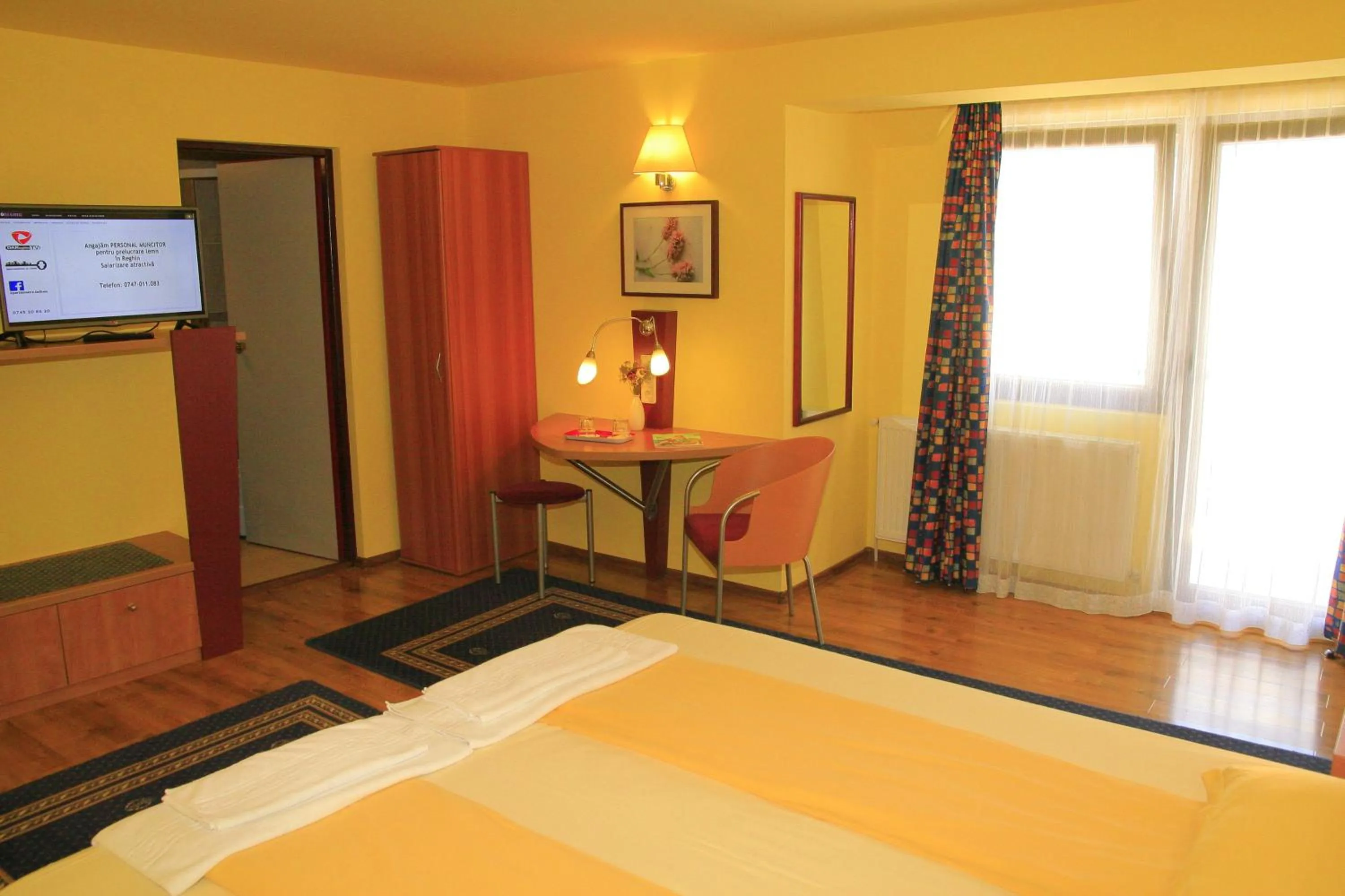 Photo of the whole room, Bed in Pensiunea Blanca