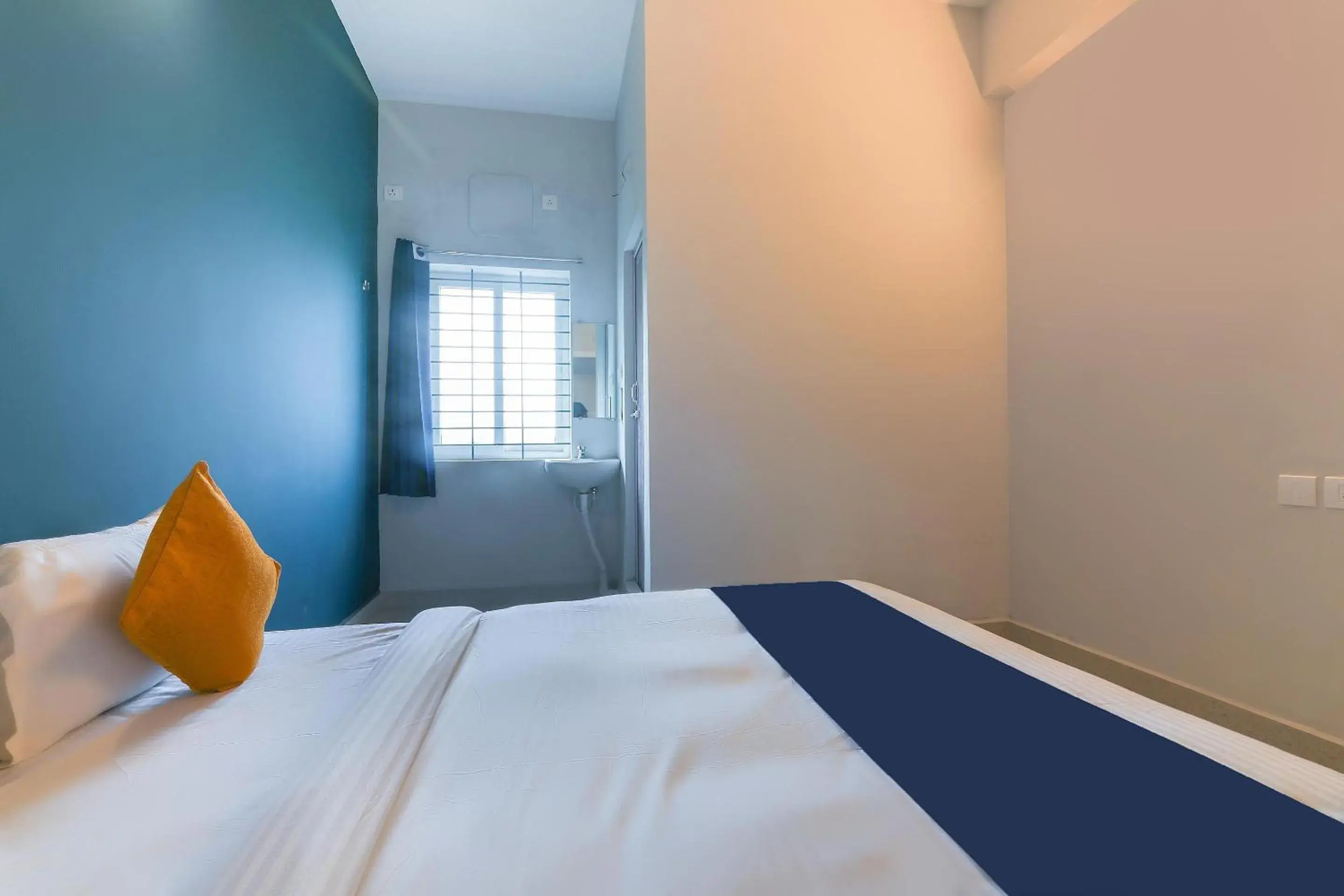 Bedroom in Hotel O Maraimalai Nagar Bedroom in Hotel O Maraimalai Nagar