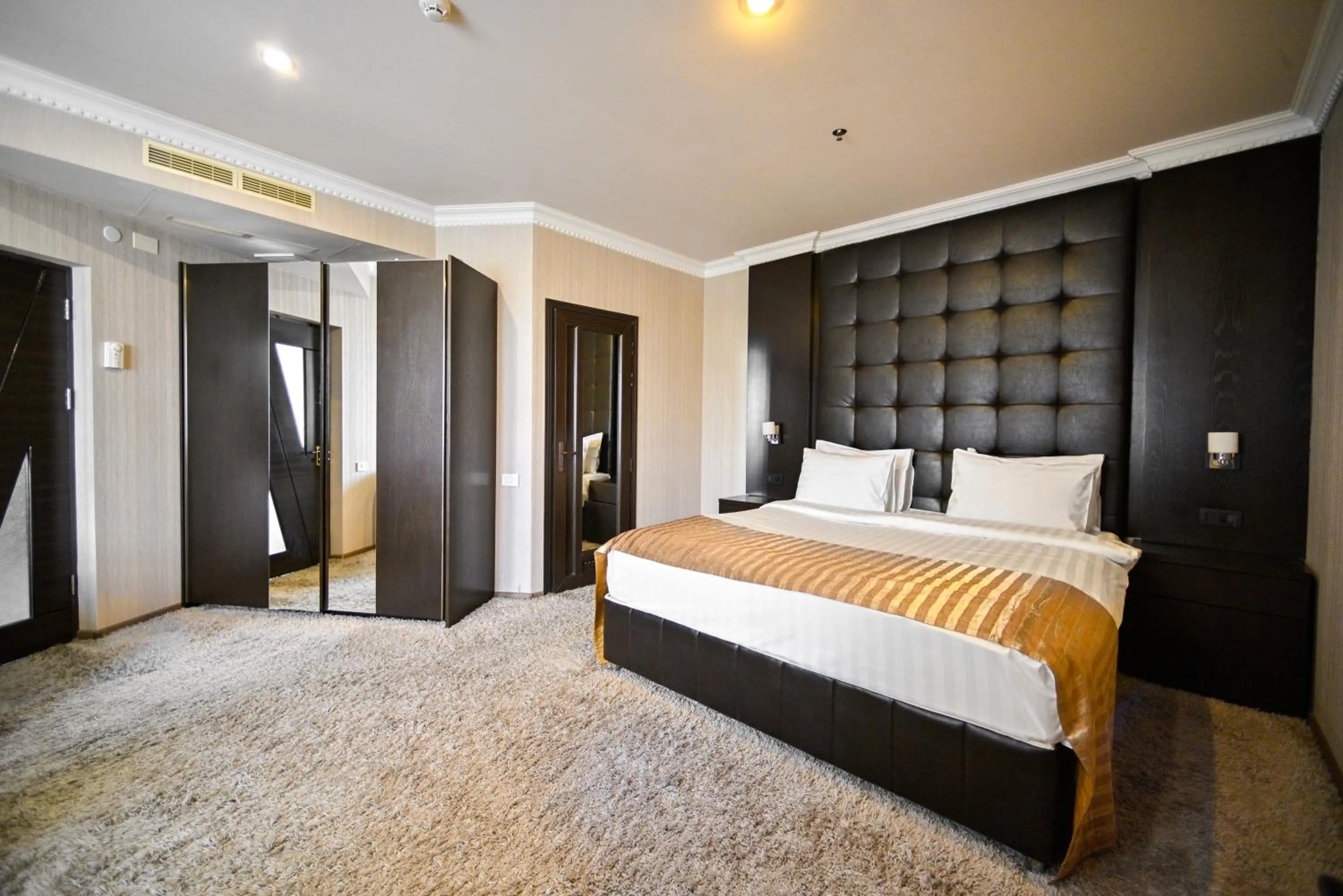 Bed in Imperial Palace Hotel Yerevan