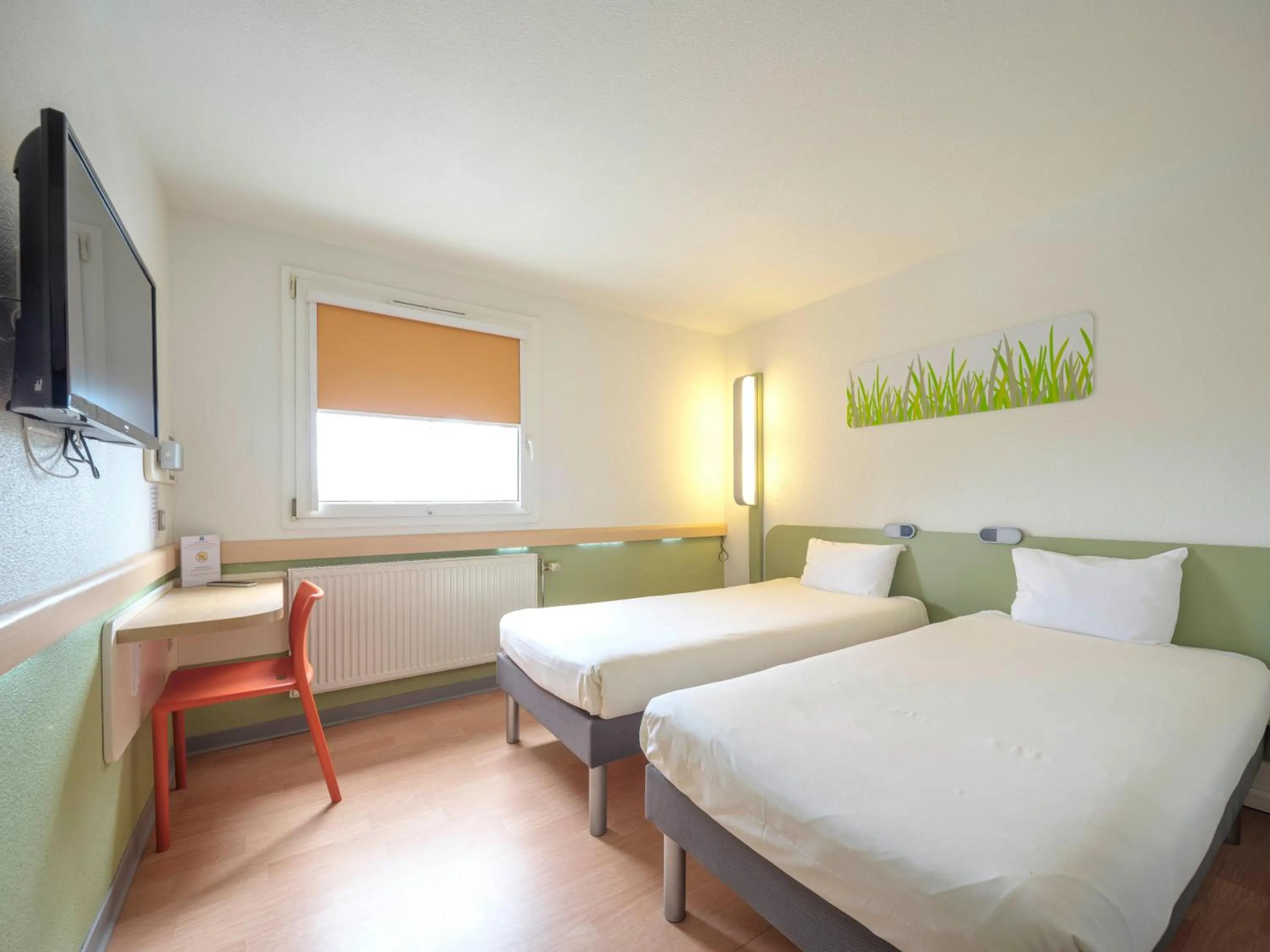 Photo of the whole room, Bed in Ibis Budget Sarrebourg Buhl