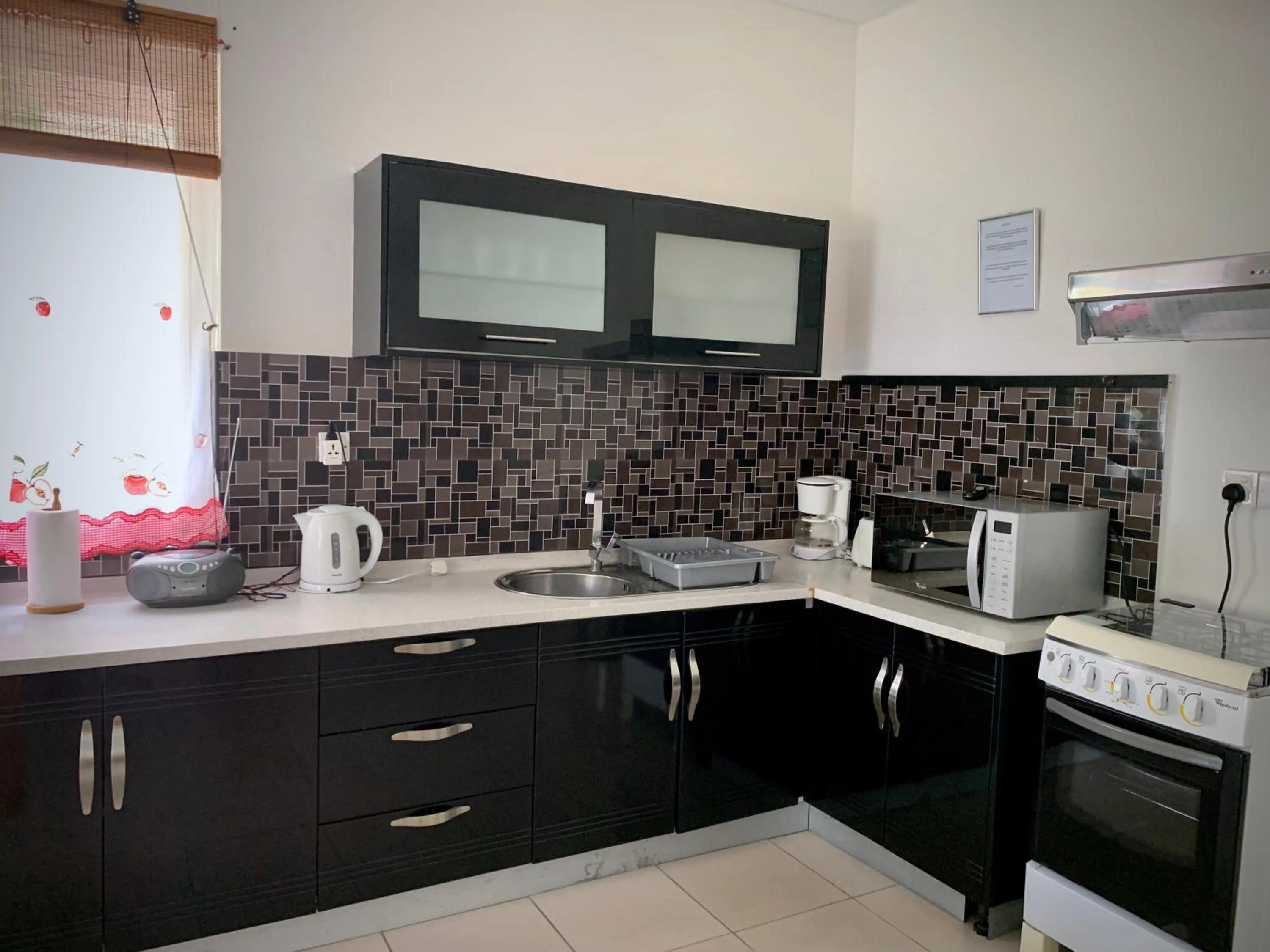 Kitchen or kitchenette in Villa Oliveraie Apartments