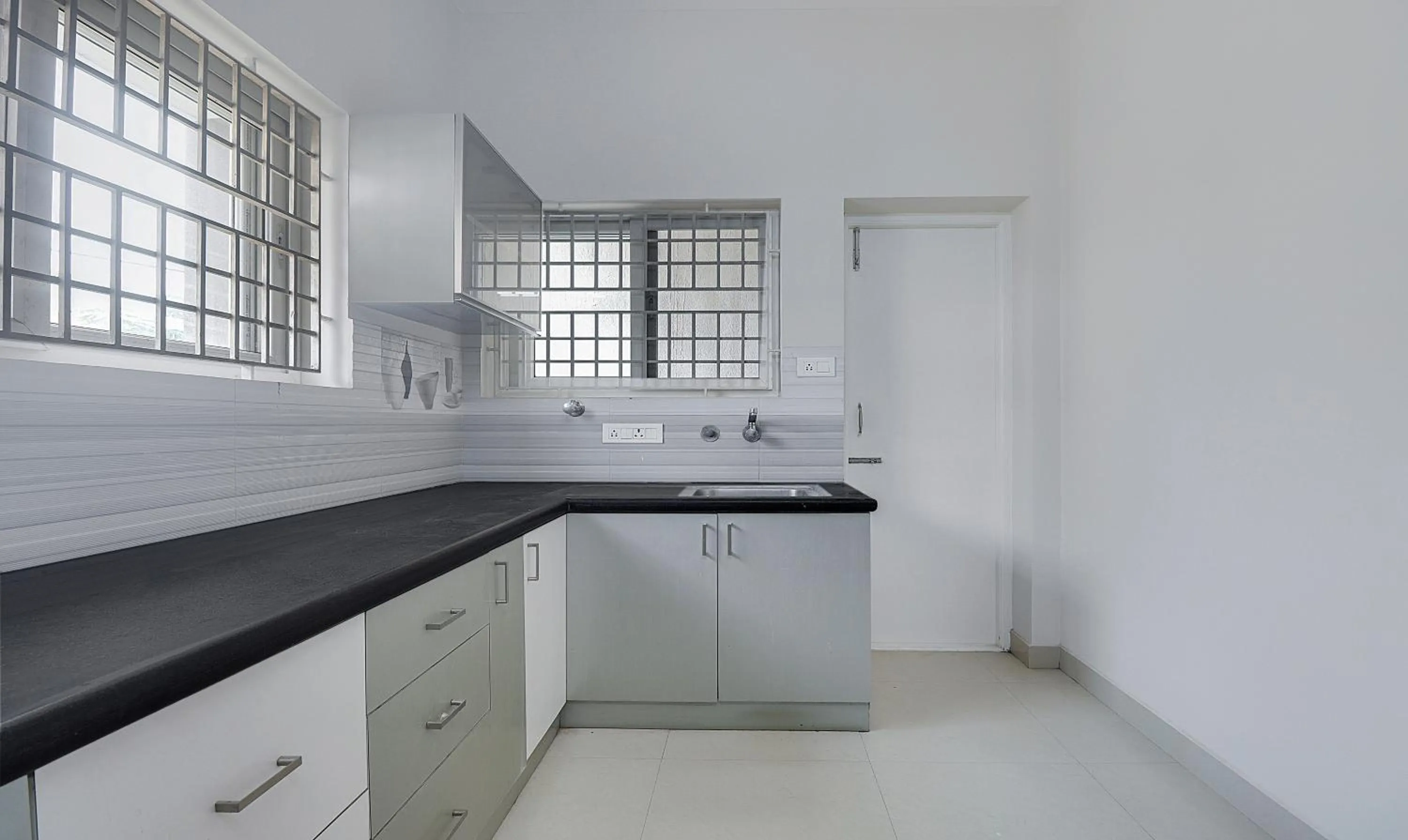 Kitchen or kitchenette in Treebo Rithikha Inn Elite Chennai Trade Centre