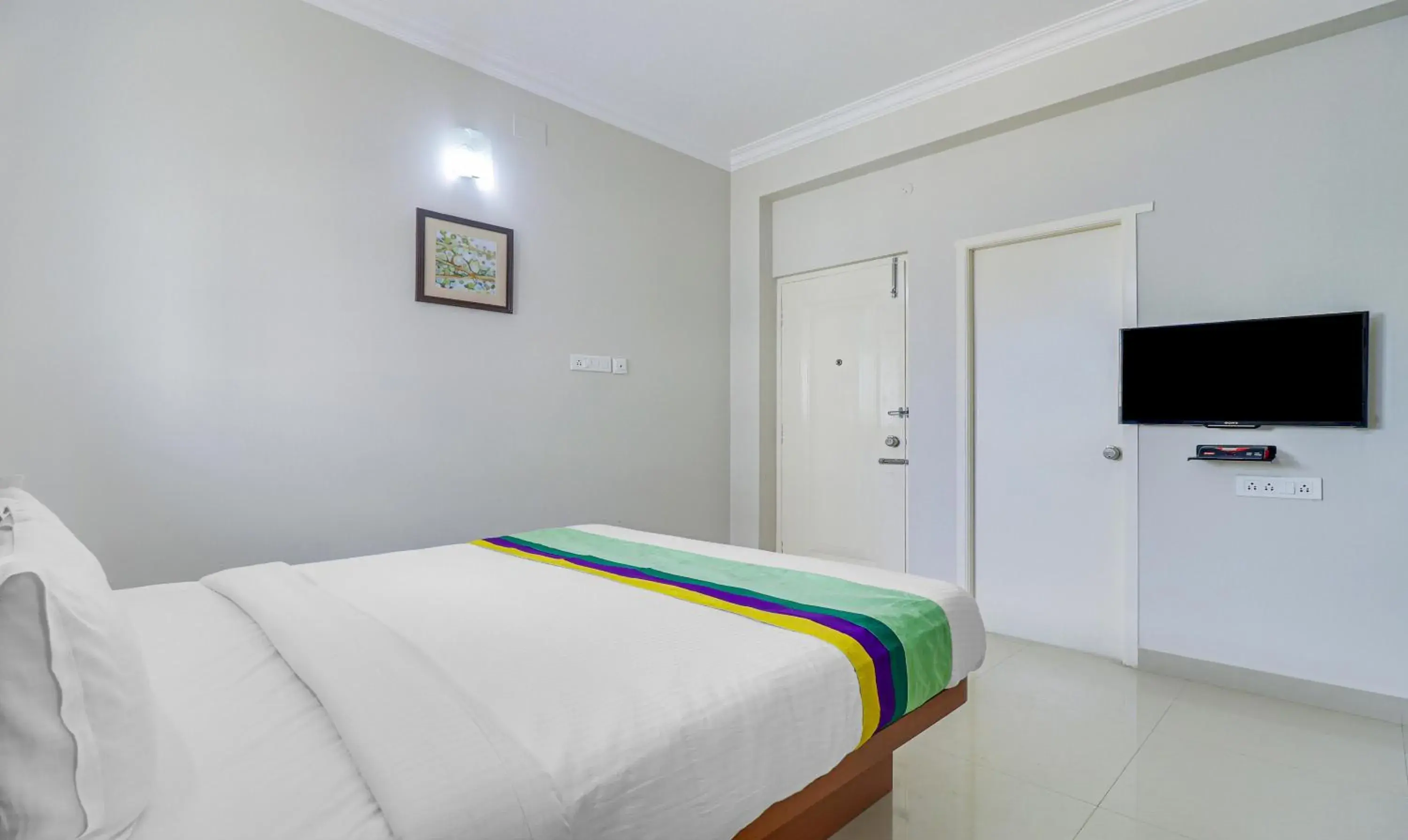 Bedroom, Bed in Treebo Rithikha Inn Elite Chennai Trade Centre Bedroom, Bed in Treebo Rithikha Inn Elite Chennai Trade Centre