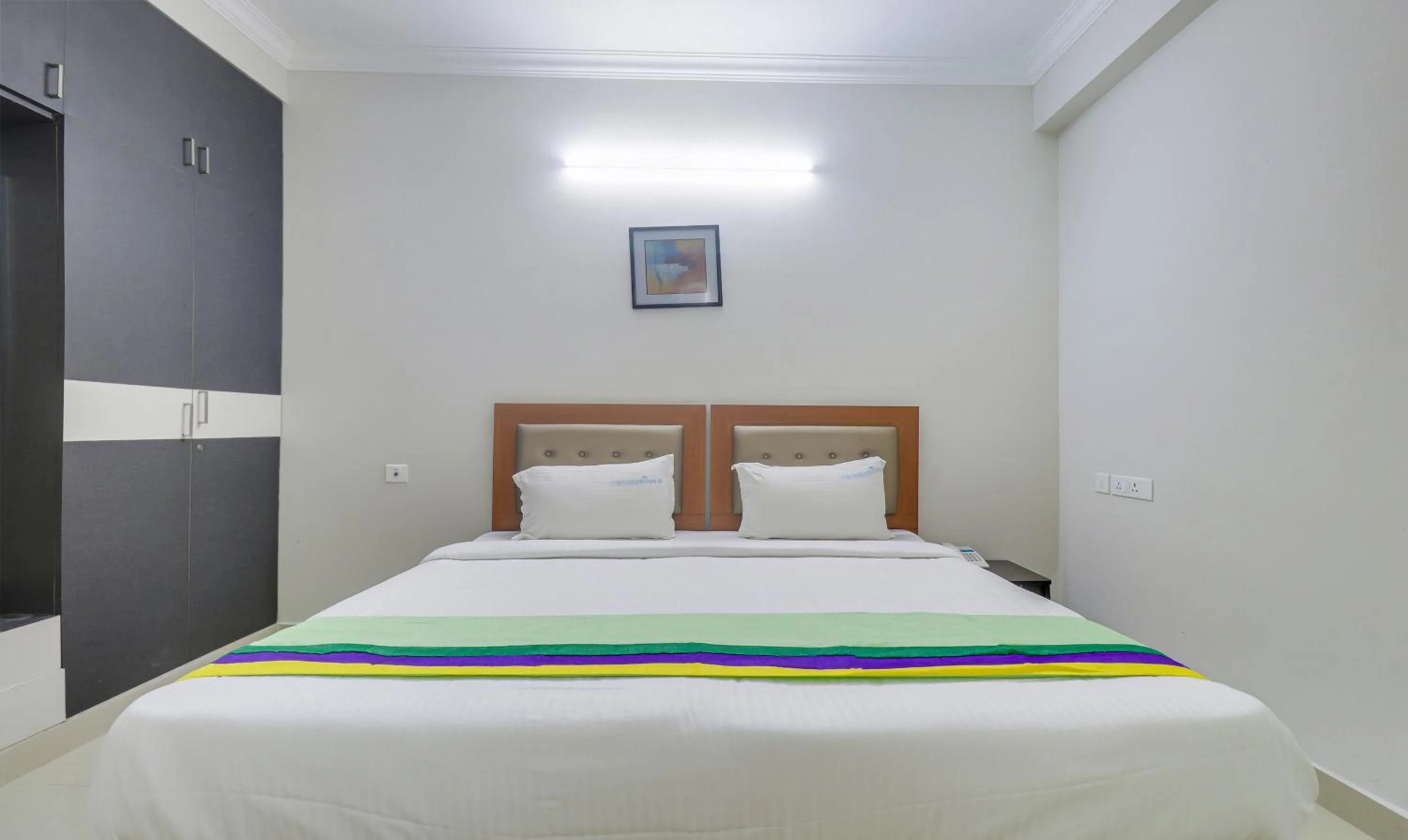 Bedroom, Bed in Treebo Rithikha Inn Elite Chennai Trade Centre