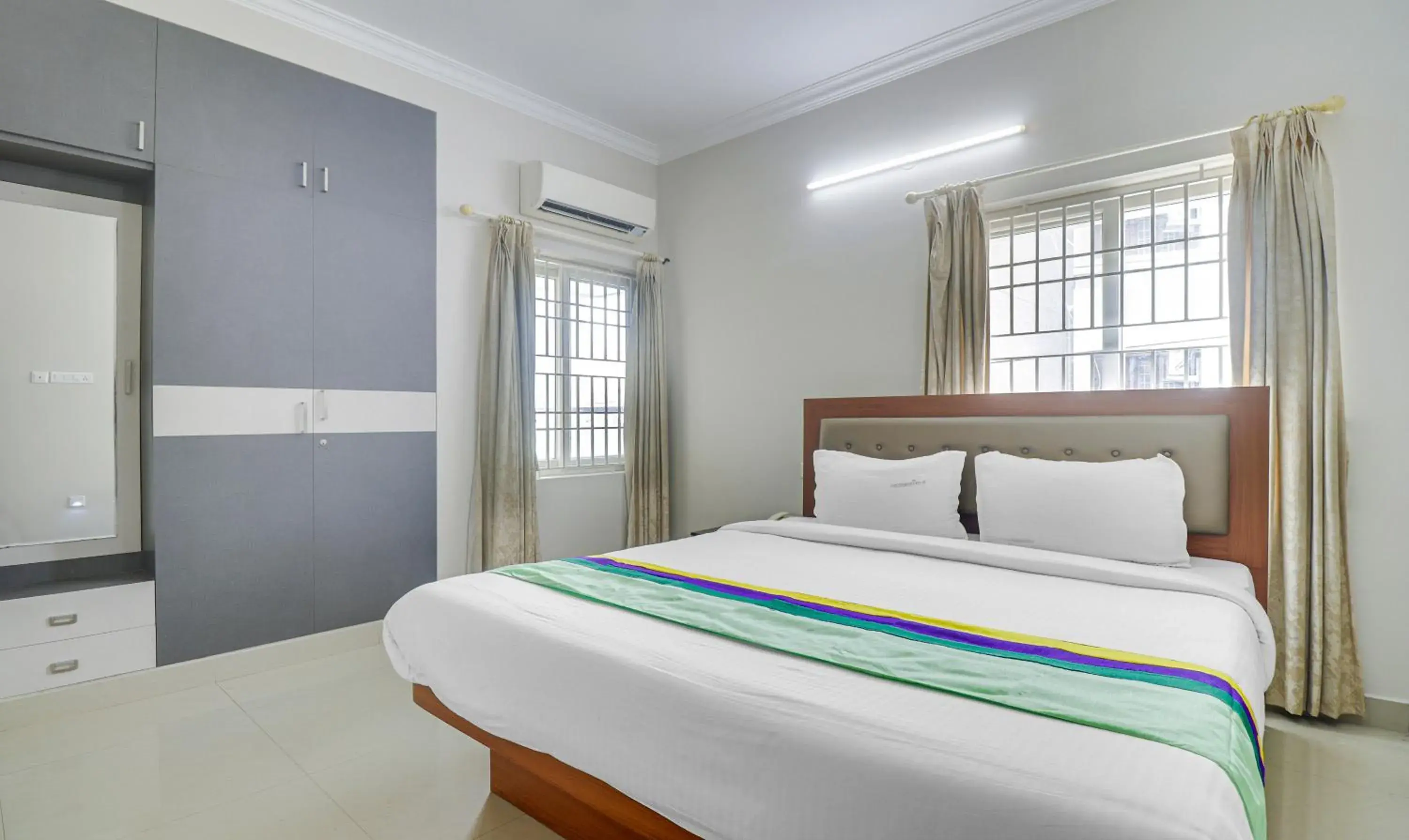 Bedroom, Bed in Treebo Rithikha Inn Elite Chennai Trade Centre Bedroom, Bed in Treebo Rithikha Inn Elite Chennai Trade Centre