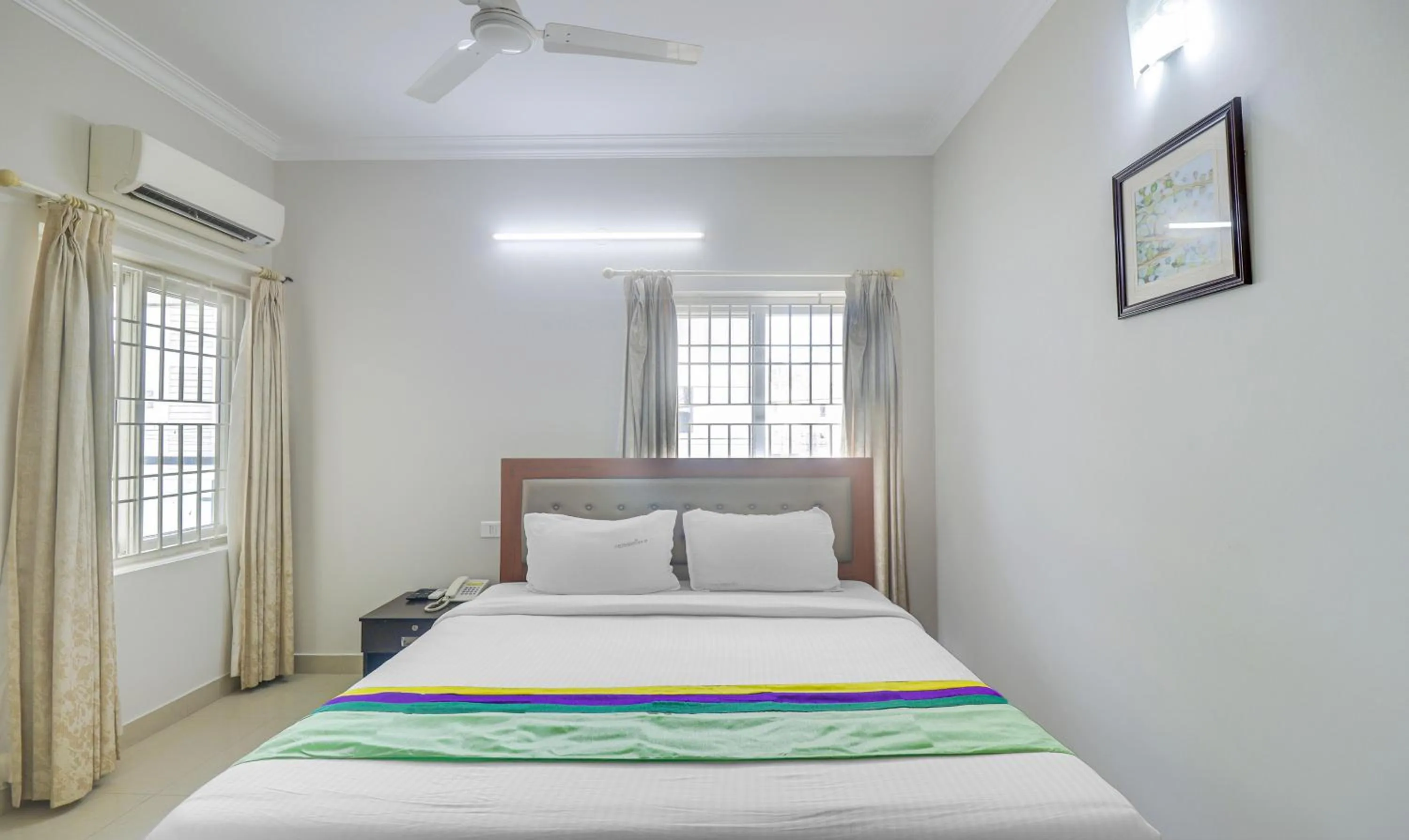 Bedroom, Bed in Treebo Rithikha Inn Elite Chennai Trade Centre