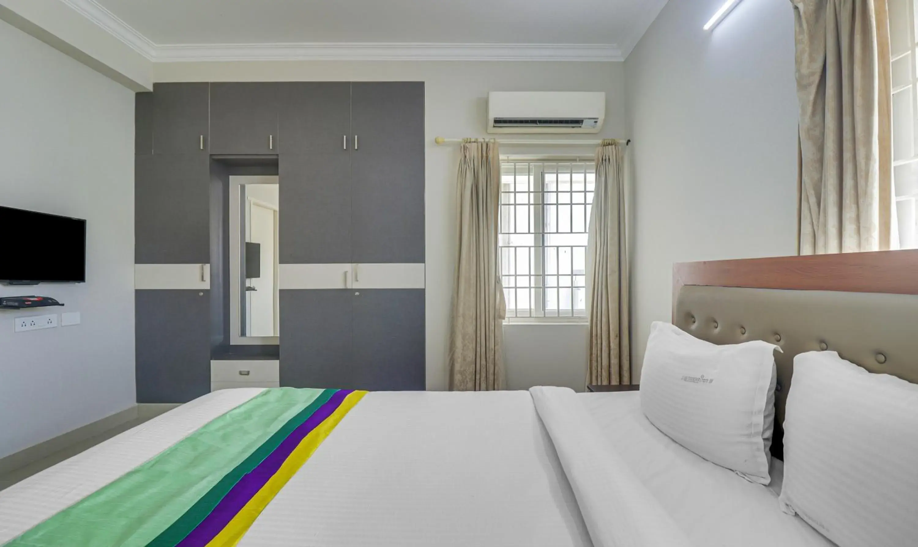 Bedroom, Bed in Treebo Rithikha Inn Elite Chennai Trade Centre Bedroom, Bed in Treebo Rithikha Inn Elite Chennai Trade Centre