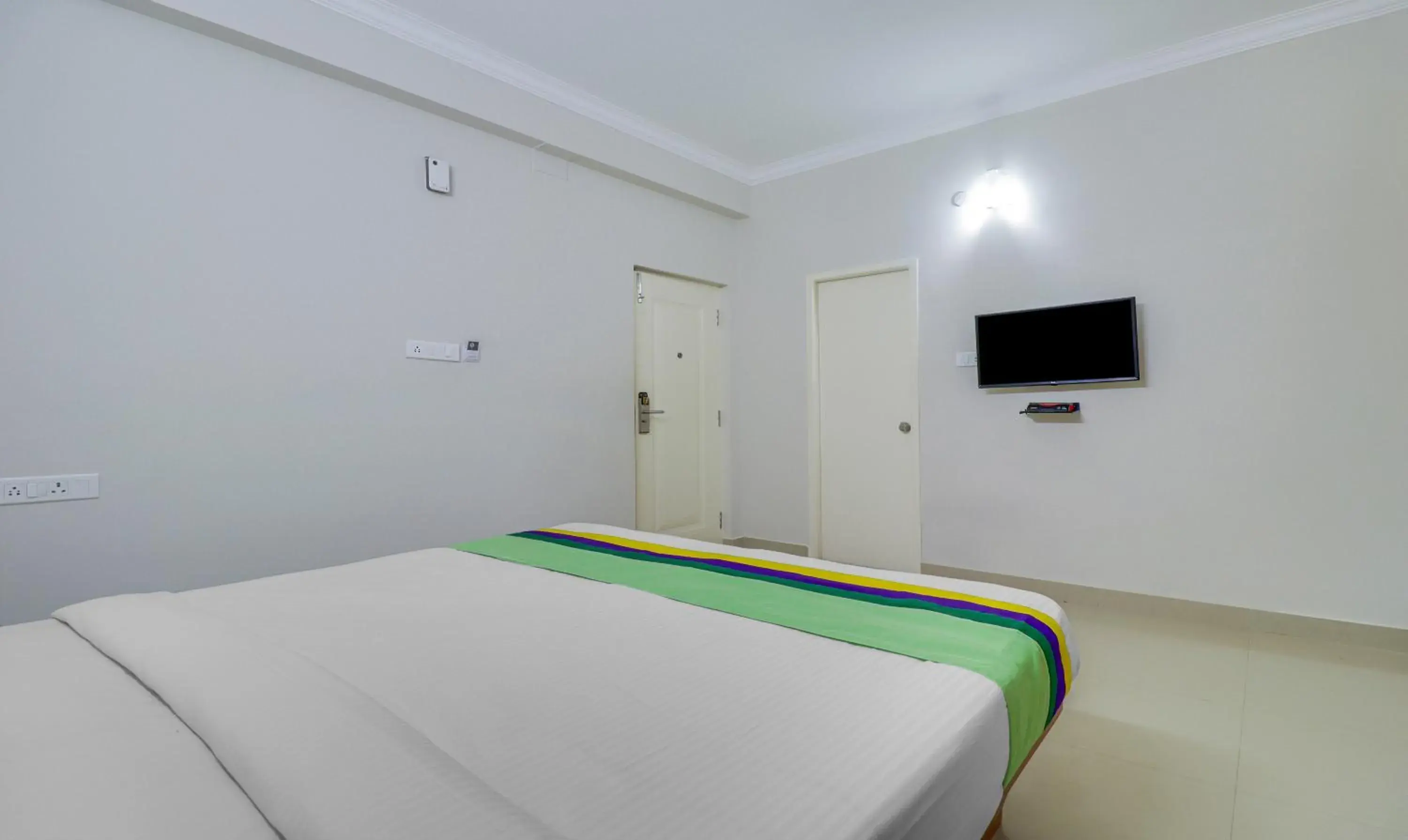 Bedroom, Bed in Treebo Rithikha Inn Elite Chennai Trade Centre Bedroom, Bed in Treebo Rithikha Inn Elite Chennai Trade Centre