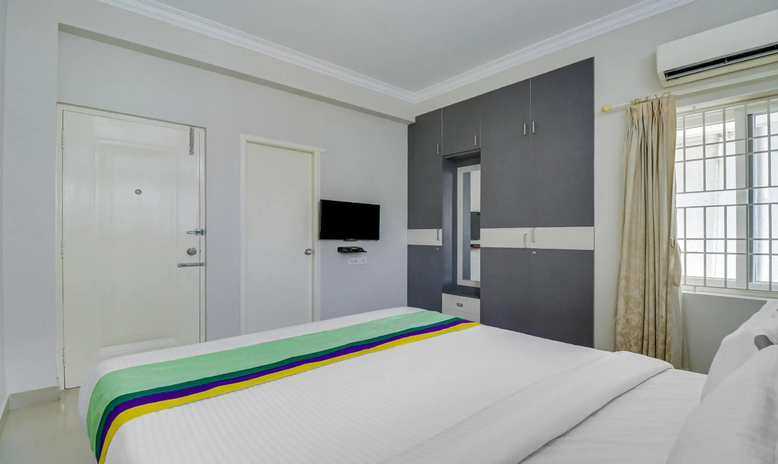 Bedroom, Bed in Treebo Rithikha Inn Elite Chennai Trade Centre Bedroom, Bed in Treebo Rithikha Inn Elite Chennai Trade Centre