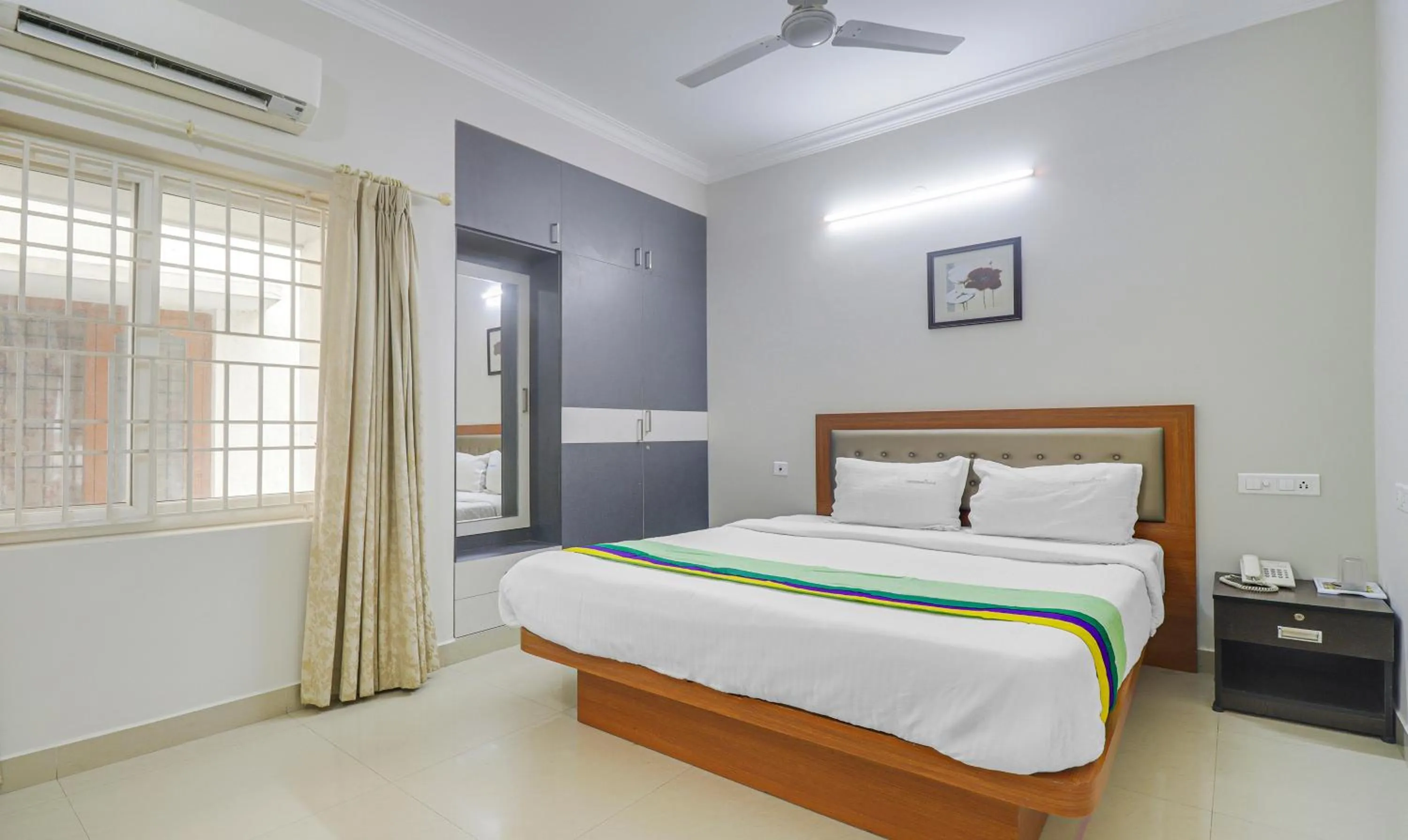 Bedroom, Bed in Treebo Rithikha Inn Elite Chennai Trade Centre