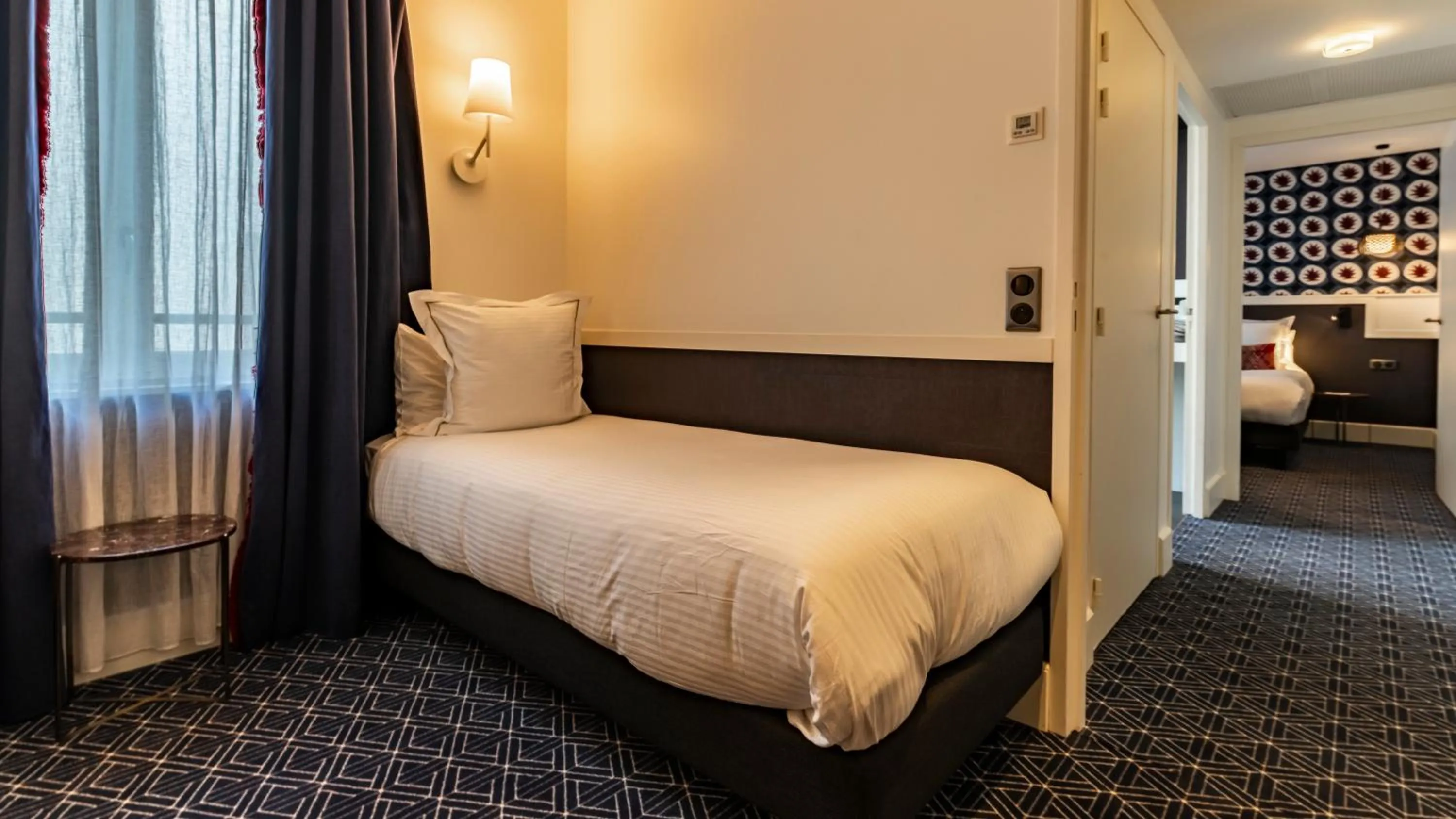 Photo of the whole room, Bed in Continental Hotel