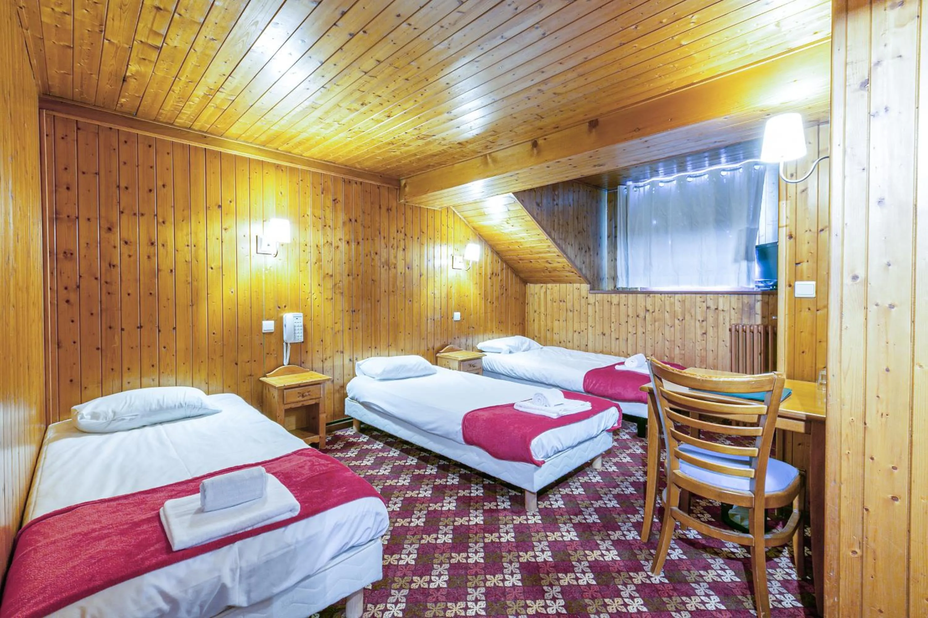 Bed in Hotel Le Chamonix