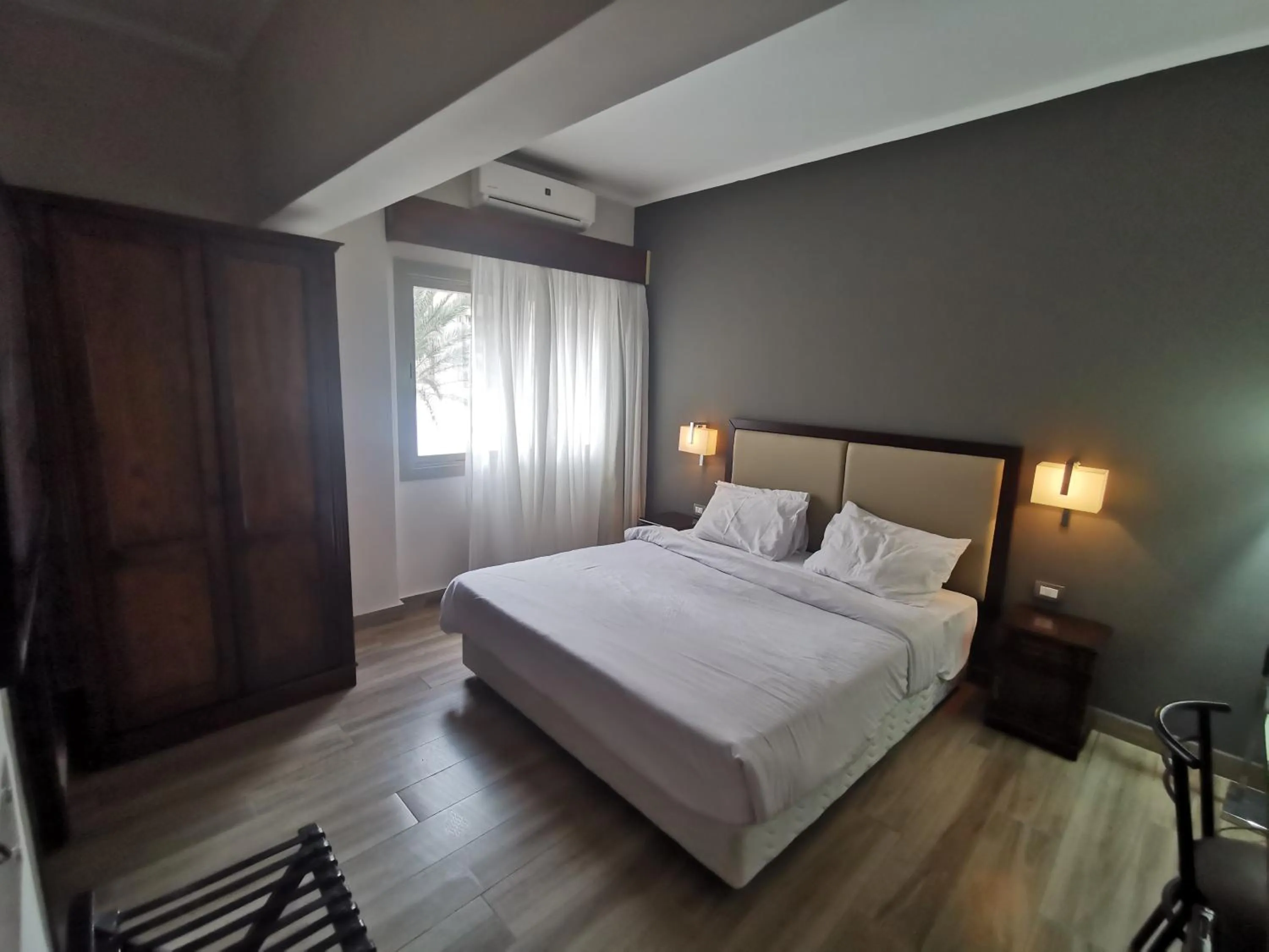 Bedroom, Bed in Green Plaza Inn '''Business &Families Only'''