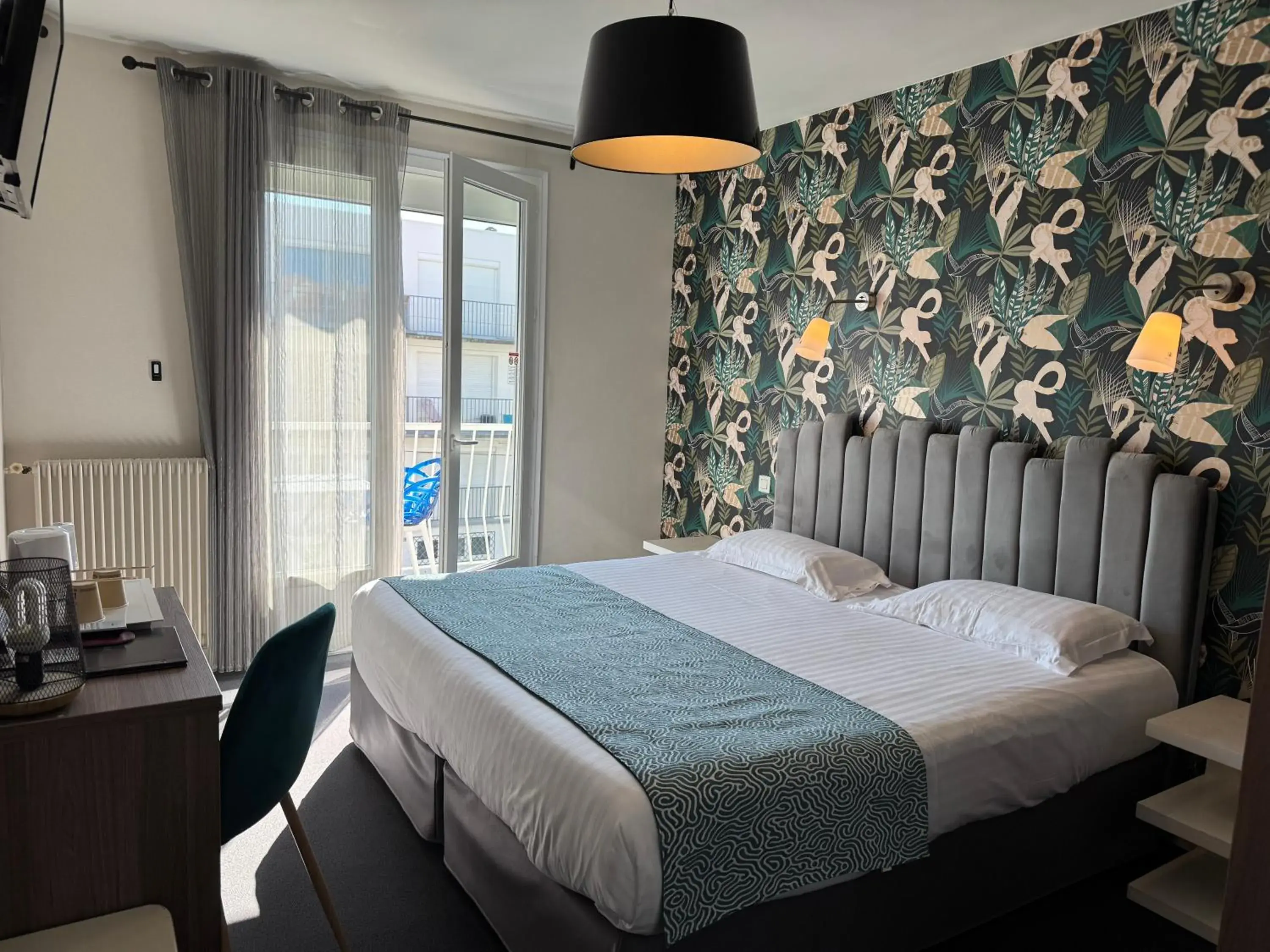 Photo of the whole room, Bed in Hôtel Calme Des Pins & Spa Photo of the whole room, Bed in Hôtel Calme Des Pins & Spa