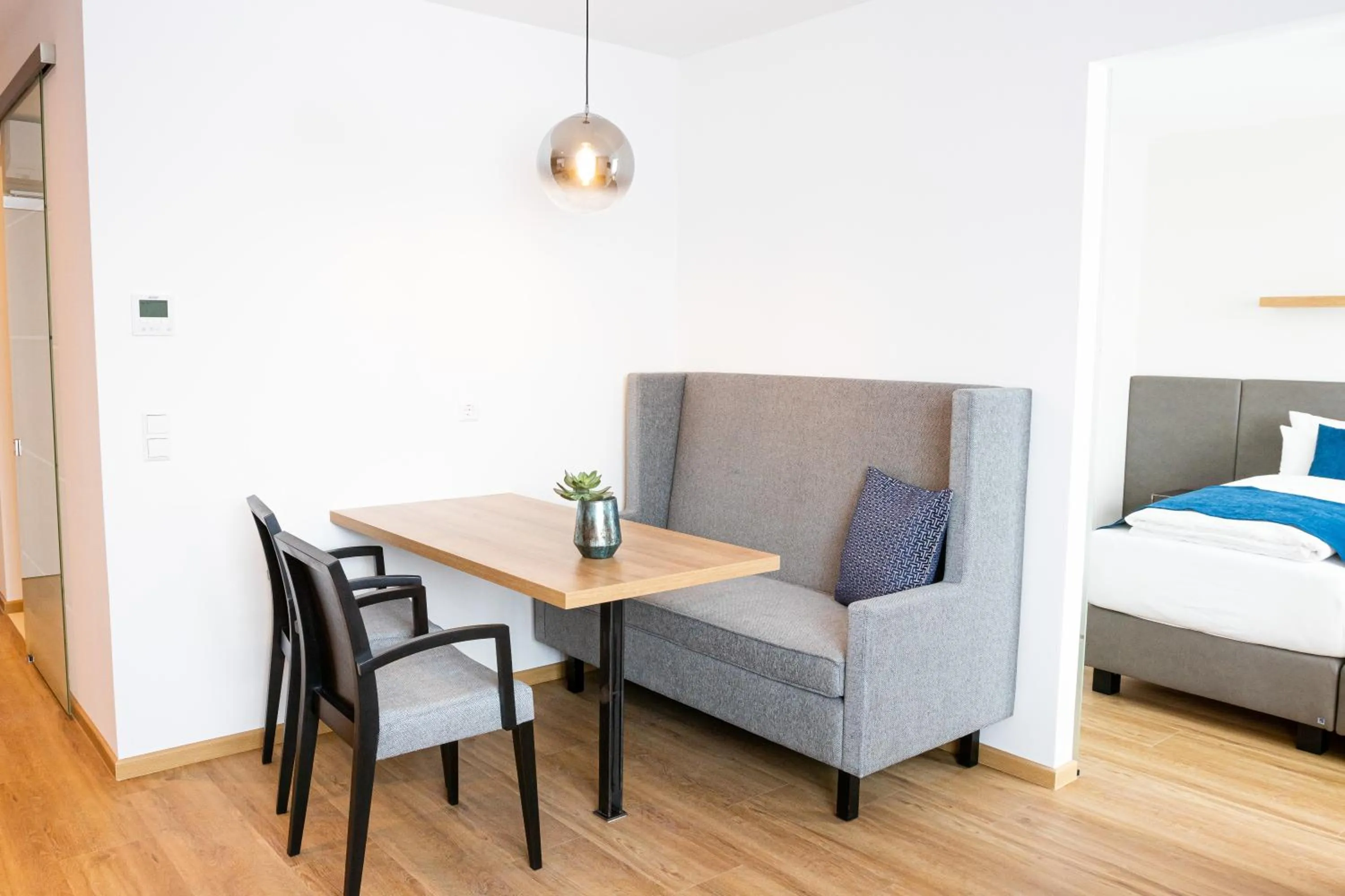 Bed in bodenseezeit Apartmenthotel Garni