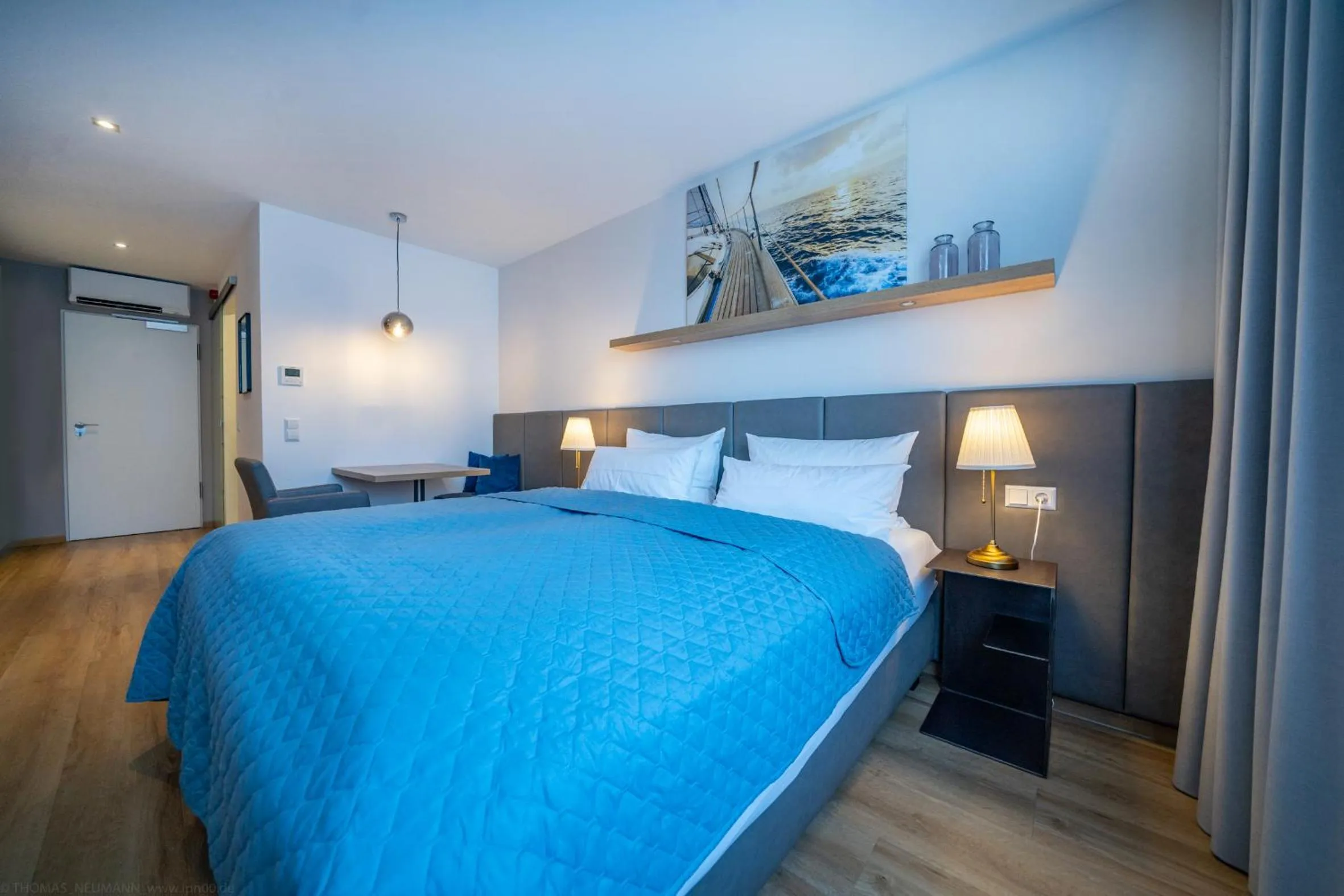 Bed in bodenseezeit Apartmenthotel Garni