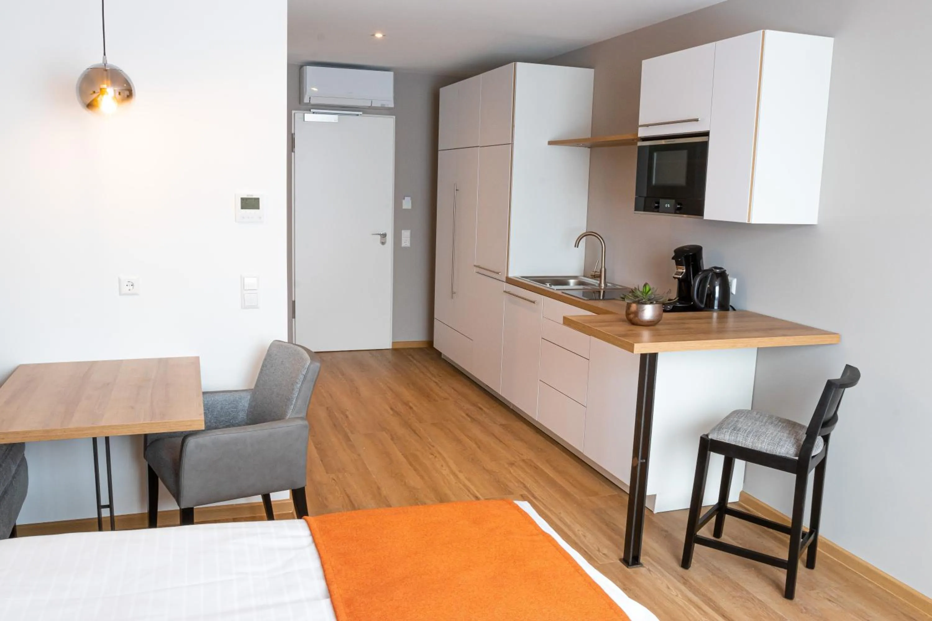 Kitchen or kitchenette in bodenseezeit Apartmenthotel Garni