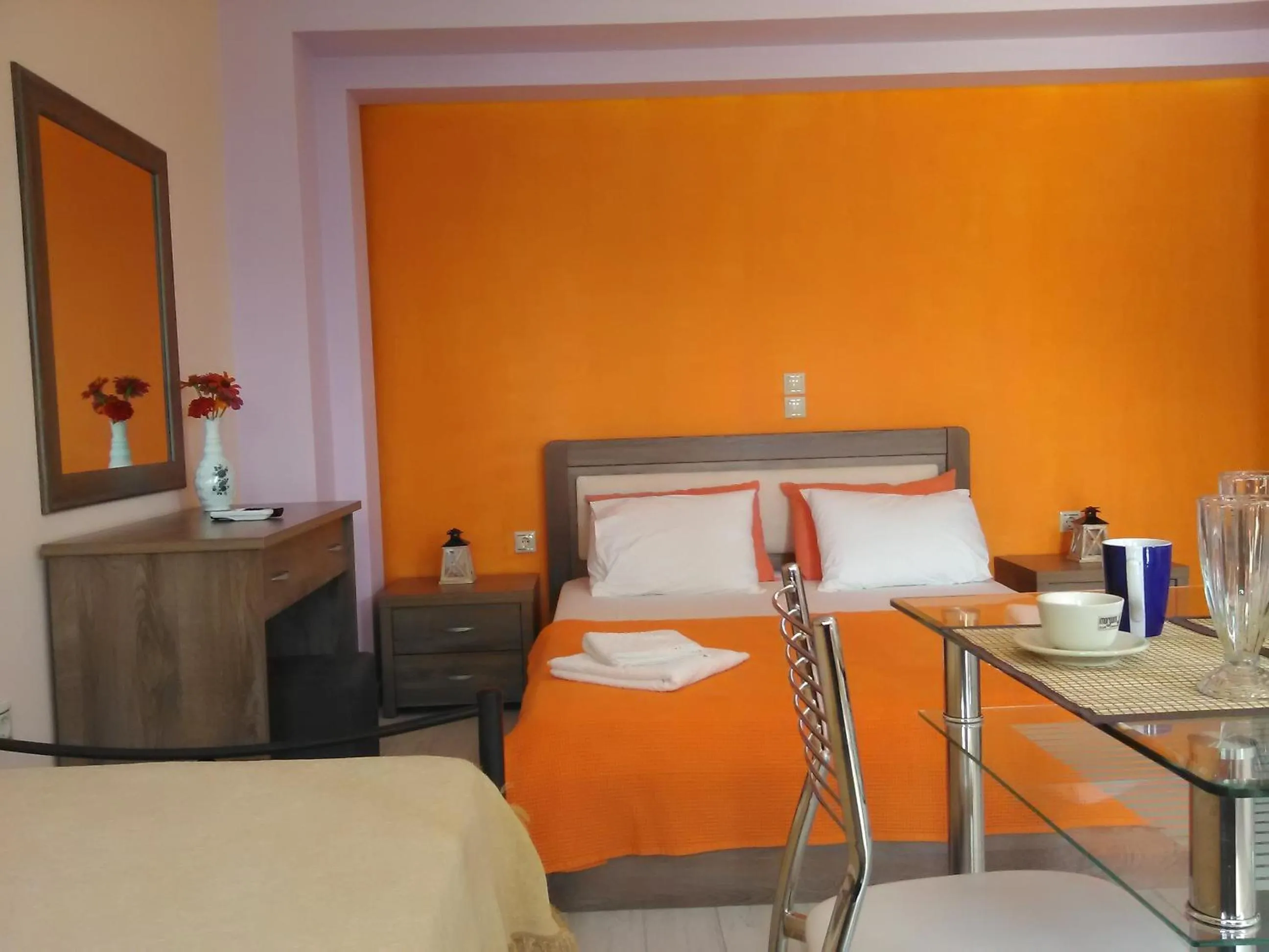 Bedroom in Mikros Gialos Apartments