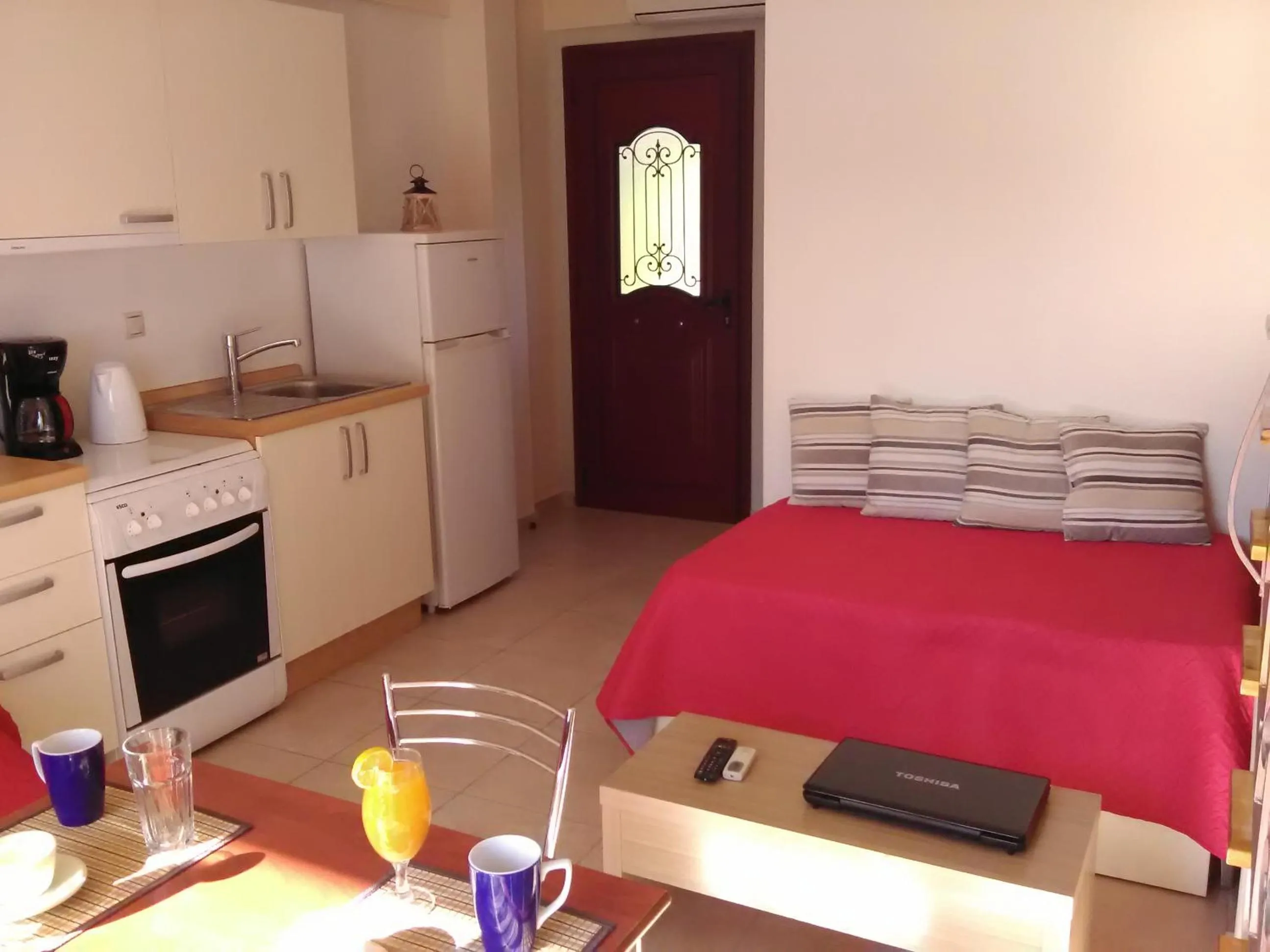 Kitchen or kitchenette in Mikros Gialos Apartments