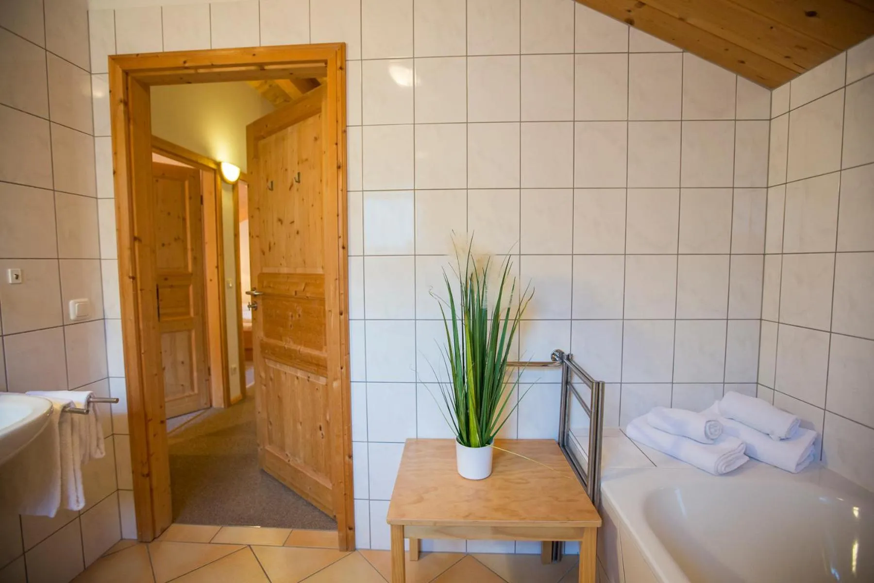 Bathroom in Alpendorf Dachstein West by ALPS RESORTS