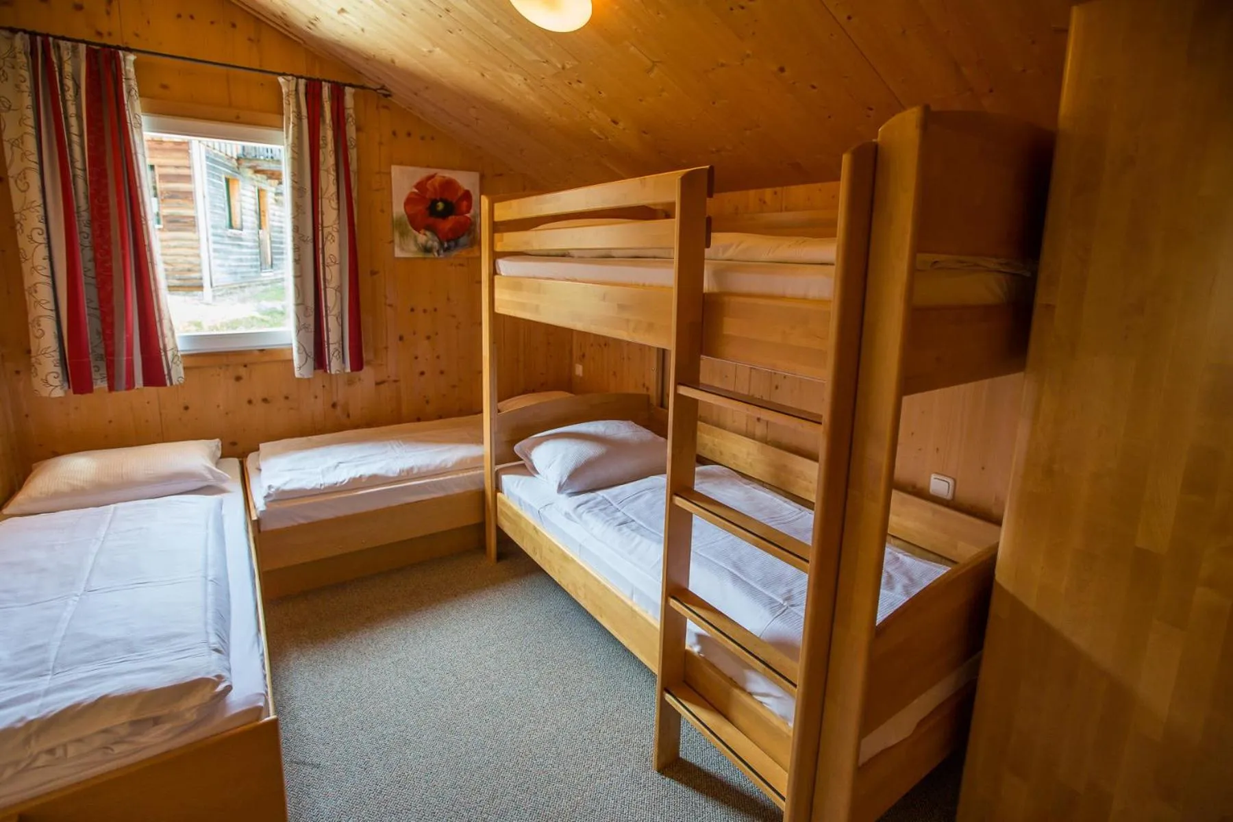 Bedroom, Bed in Alpendorf Dachstein West by ALPS RESORTS