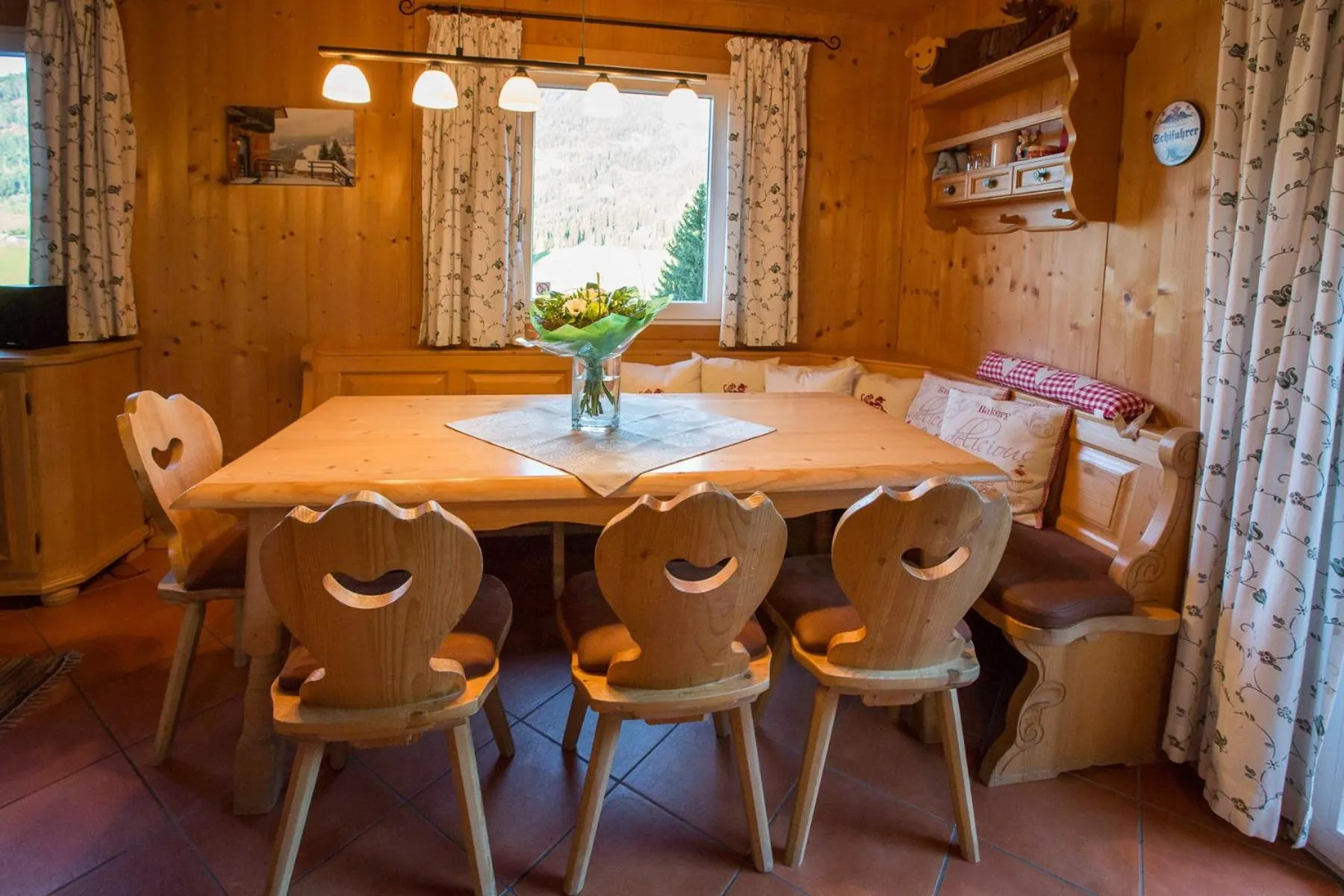 Dining area in Alpendorf Dachstein West by ALPS RESORTS