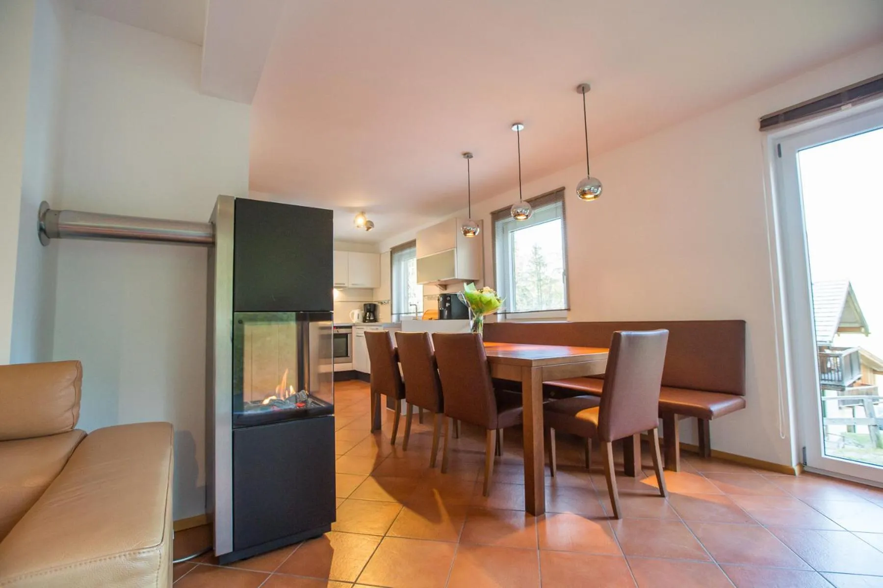 Dining area in Alpendorf Dachstein West by ALPS RESORTS