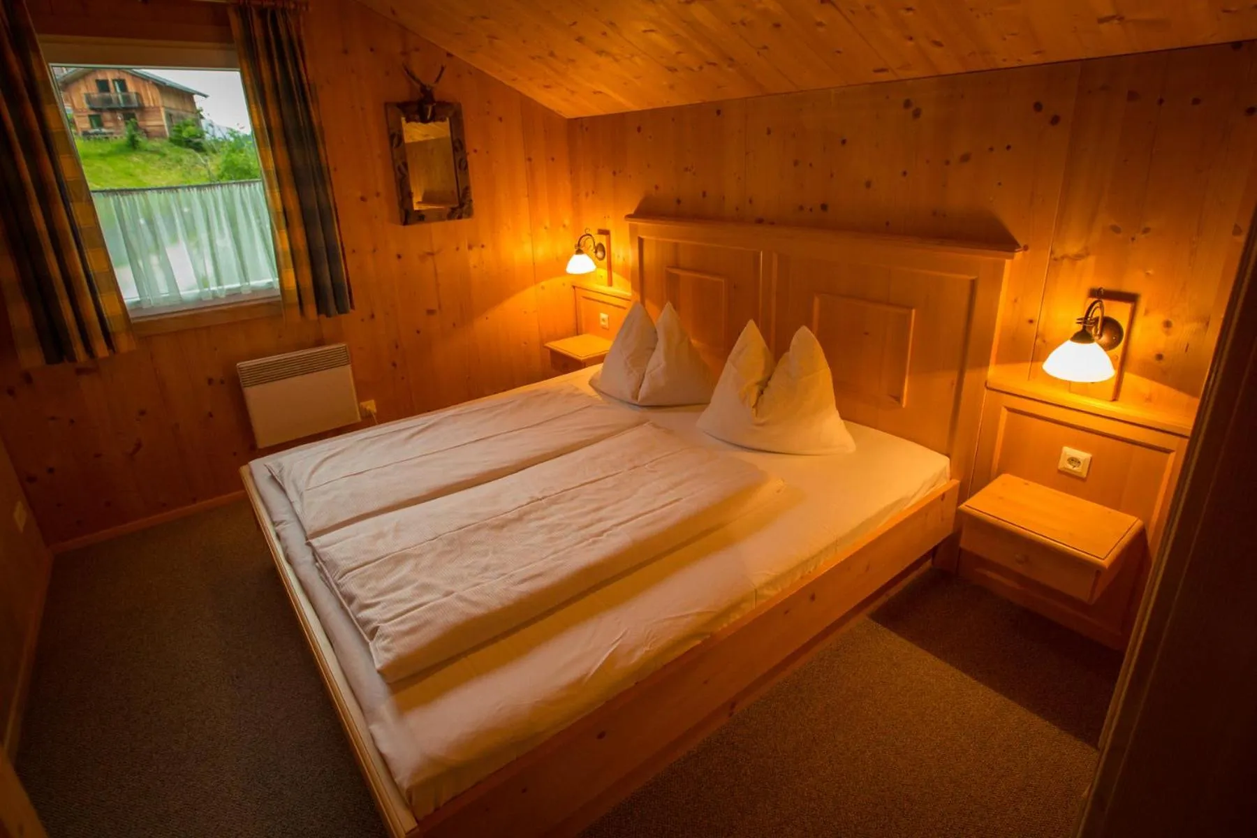 Bedroom, Bed in Alpendorf Dachstein West by ALPS RESORTS