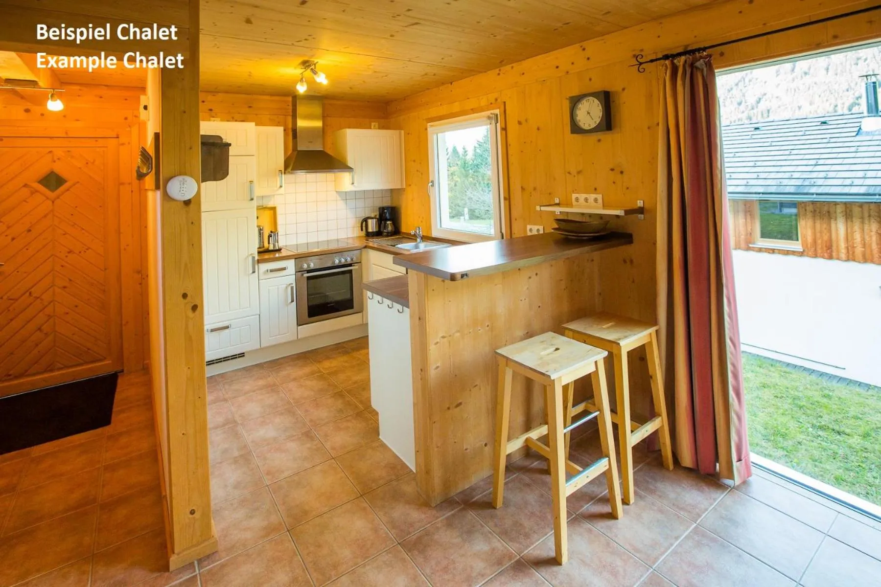 Kitchen or kitchenette in Alpendorf Dachstein West by ALPS RESORTS