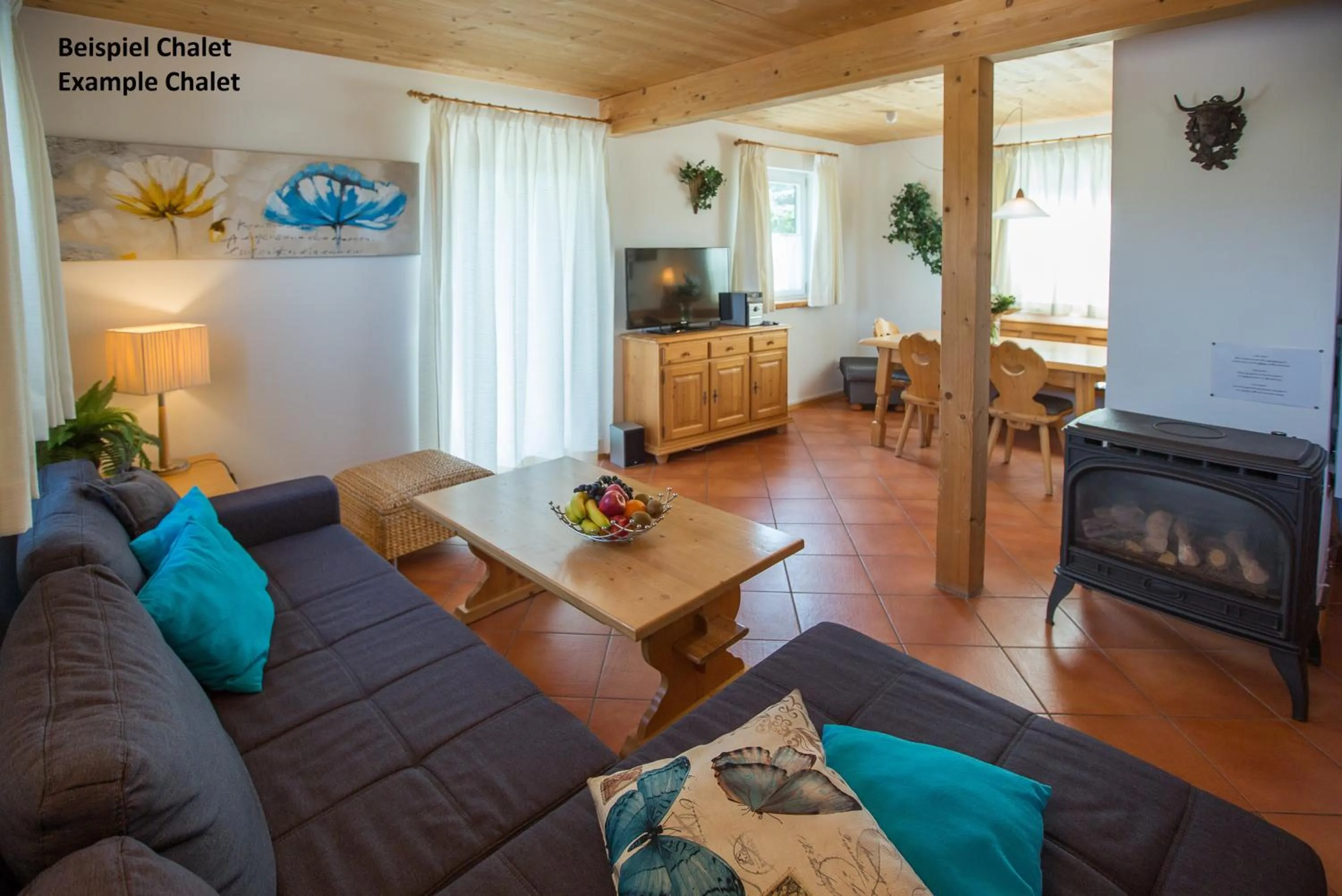 Living room in Alpendorf Dachstein West by ALPS RESORTS