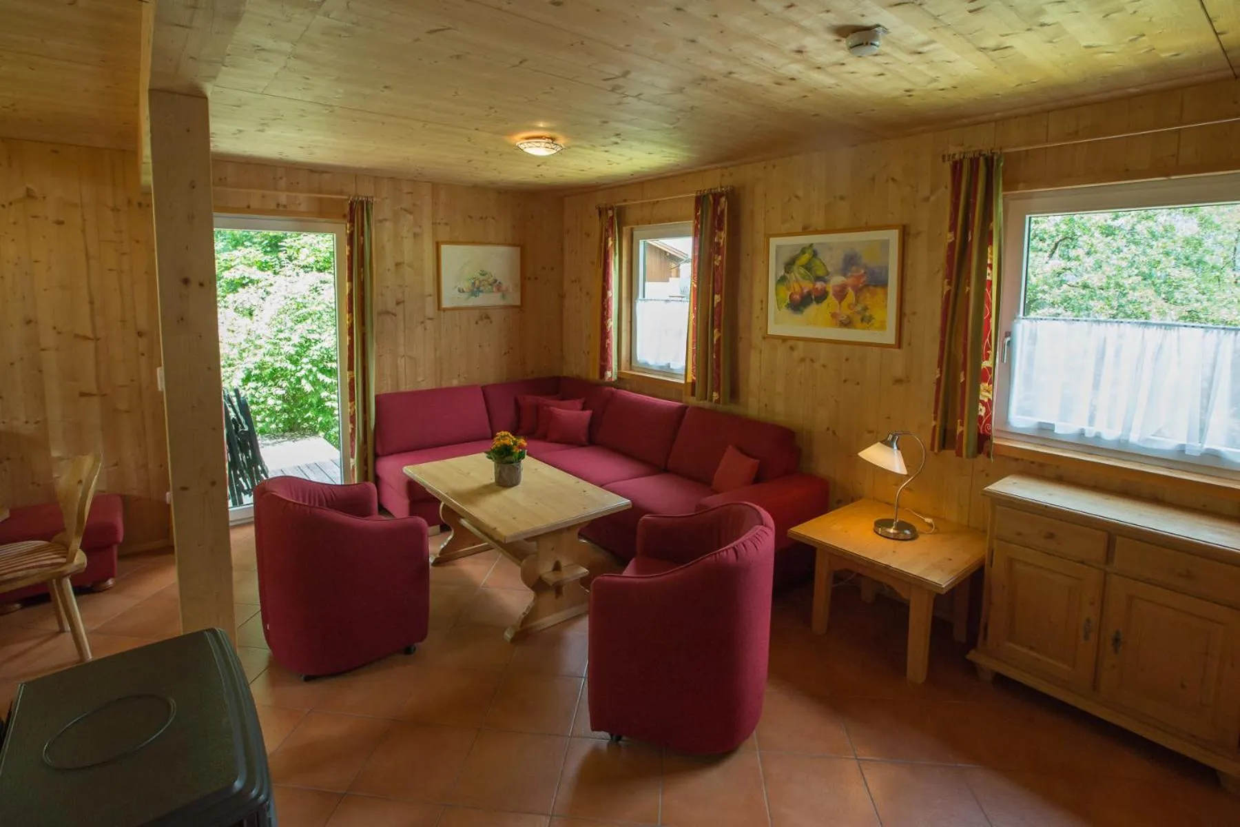 Living room in Alpendorf Dachstein West by ALPS RESORTS