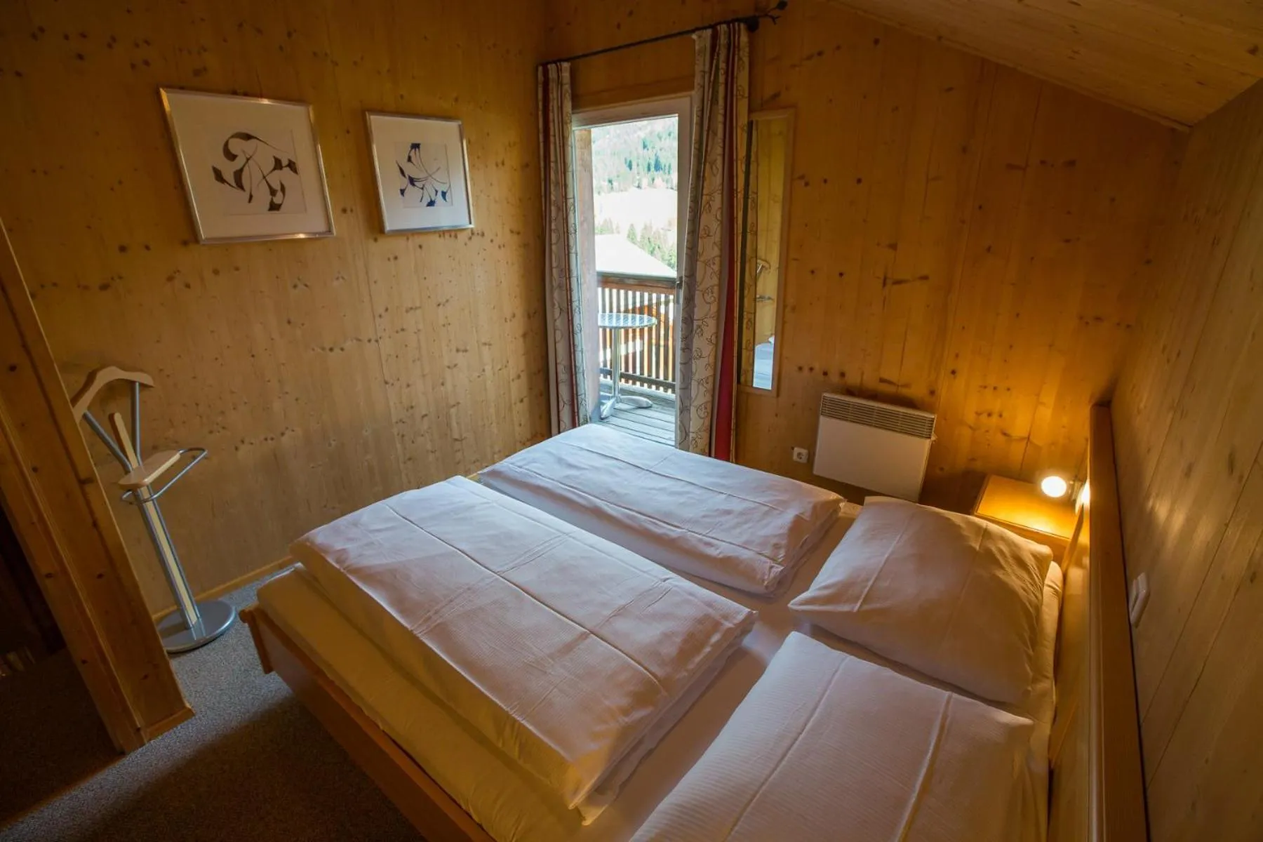 Bedroom, Bed in Alpendorf Dachstein West by ALPS RESORTS