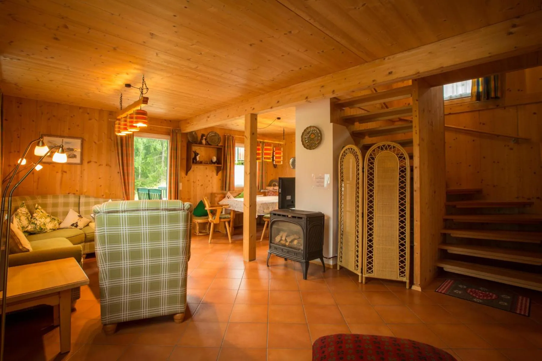 Living room in Alpendorf Dachstein West by ALPS RESORTS