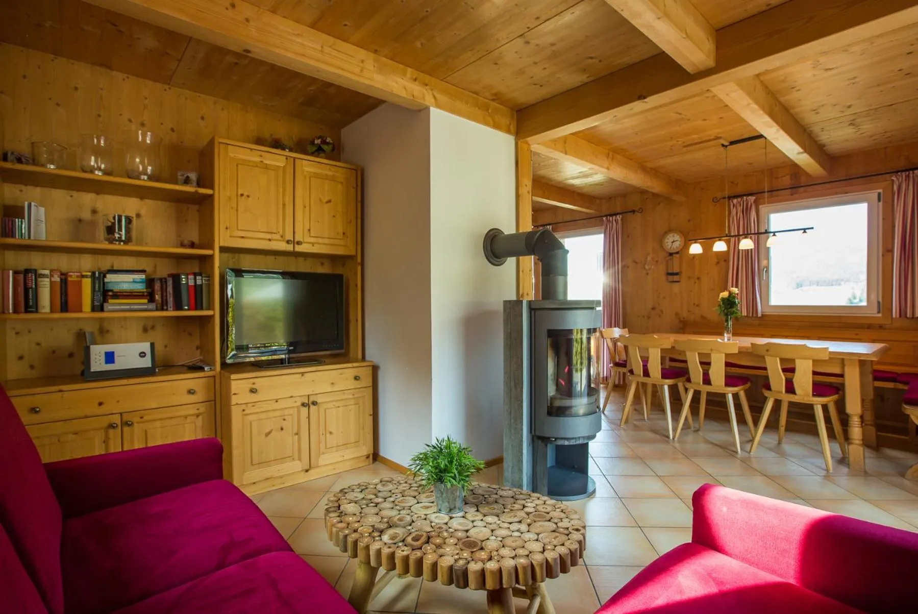 Living room in Alpendorf Dachstein West by ALPS RESORTS