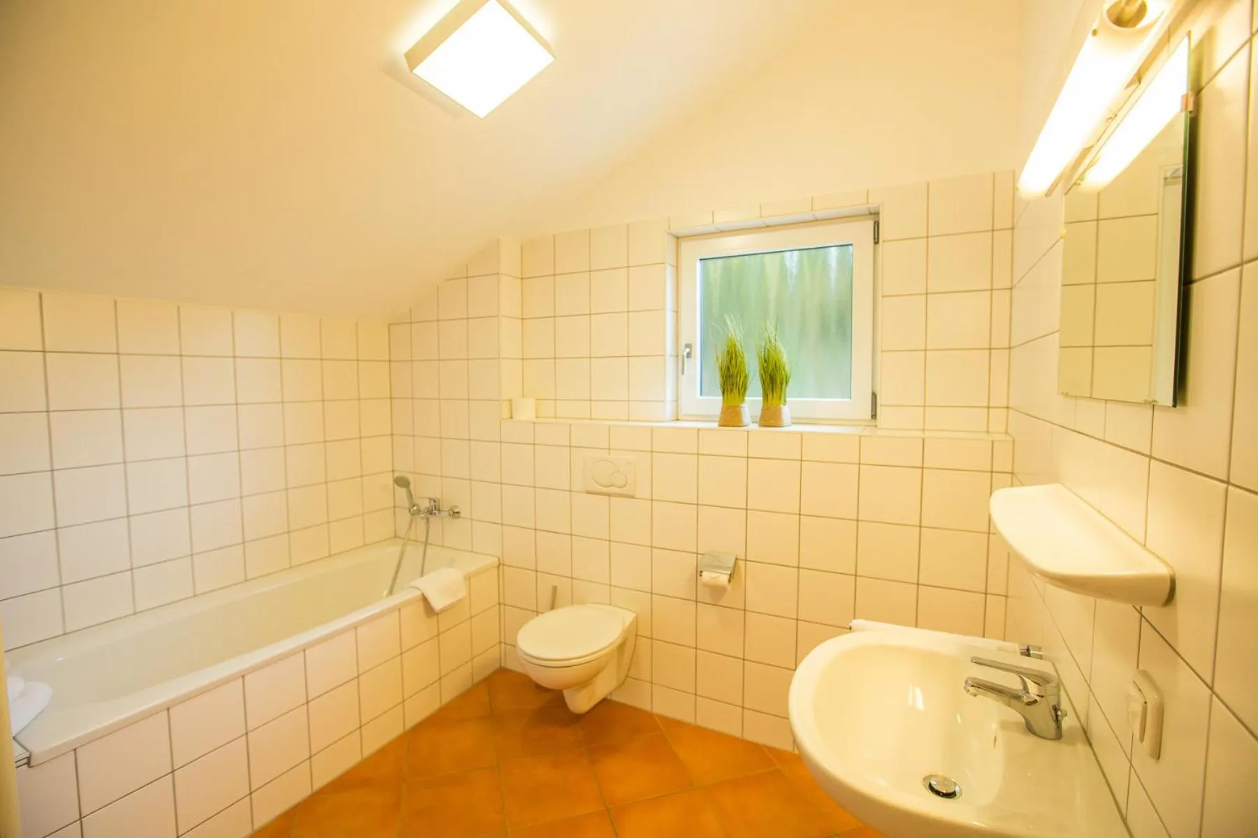 Bathroom in Alpendorf Dachstein West by ALPS RESORTS