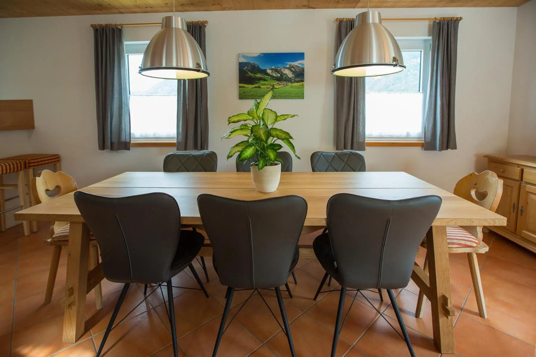 Dining area in Alpendorf Dachstein West by ALPS RESORTS