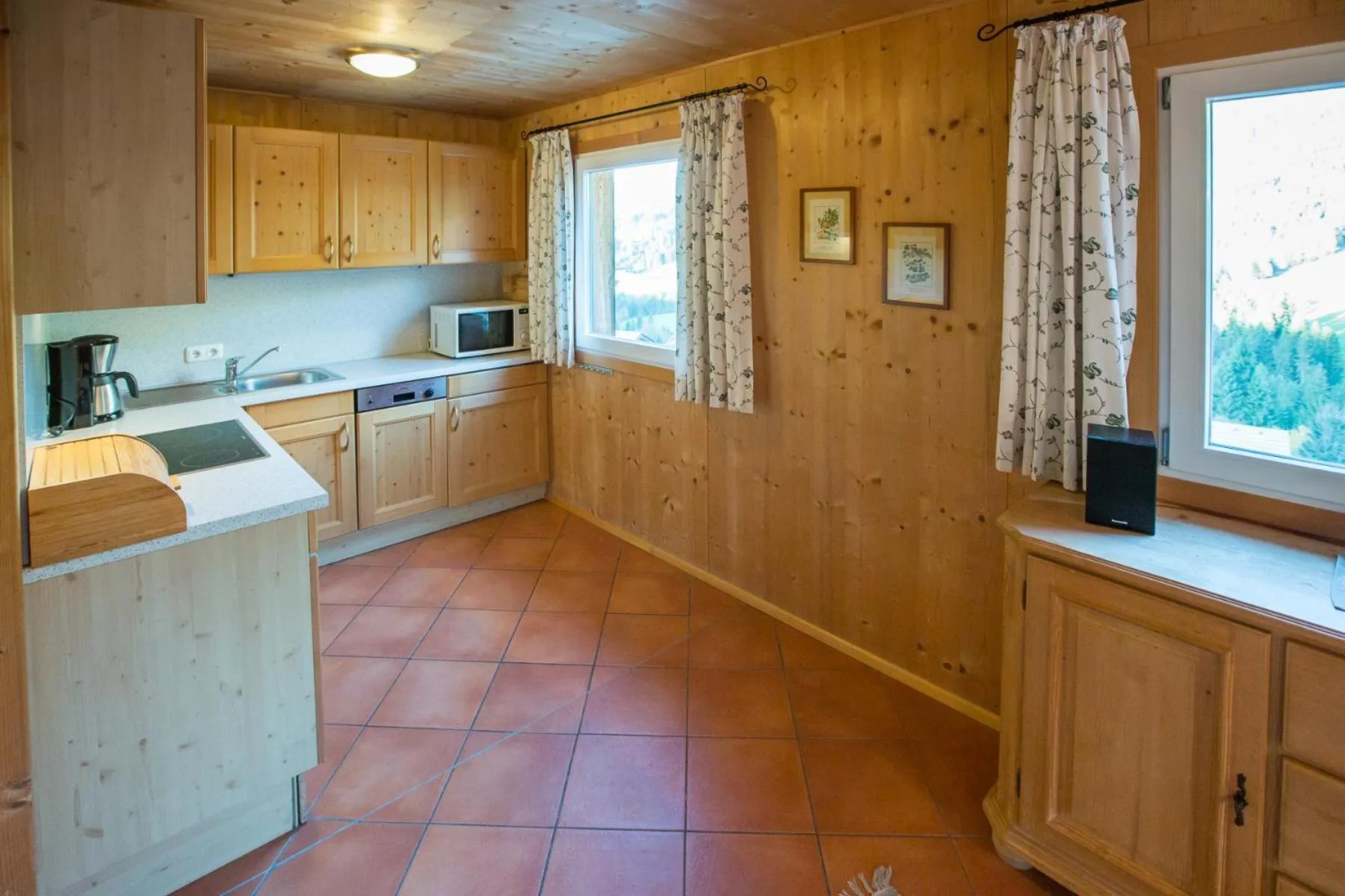 Kitchen or kitchenette in Alpendorf Dachstein West by ALPS RESORTS