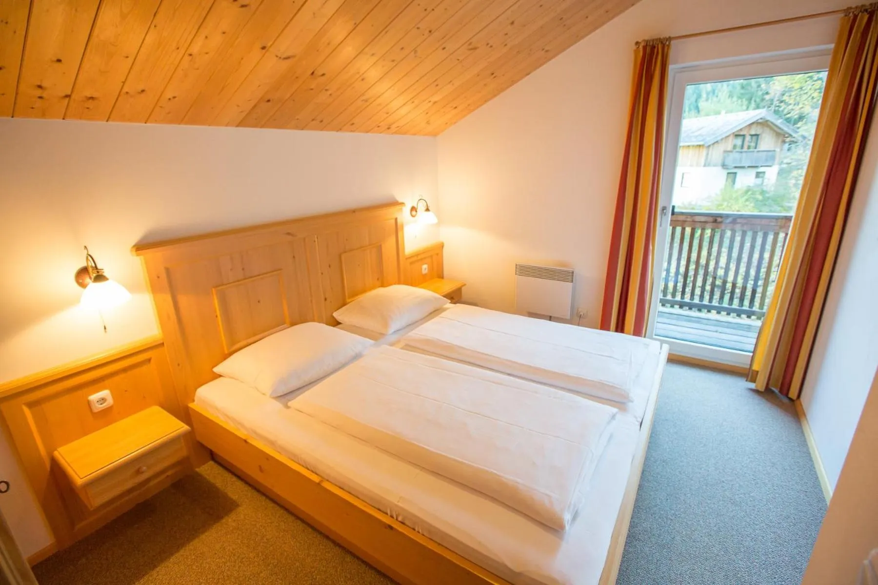 Bedroom, Bed in Alpendorf Dachstein West by ALPS RESORTS