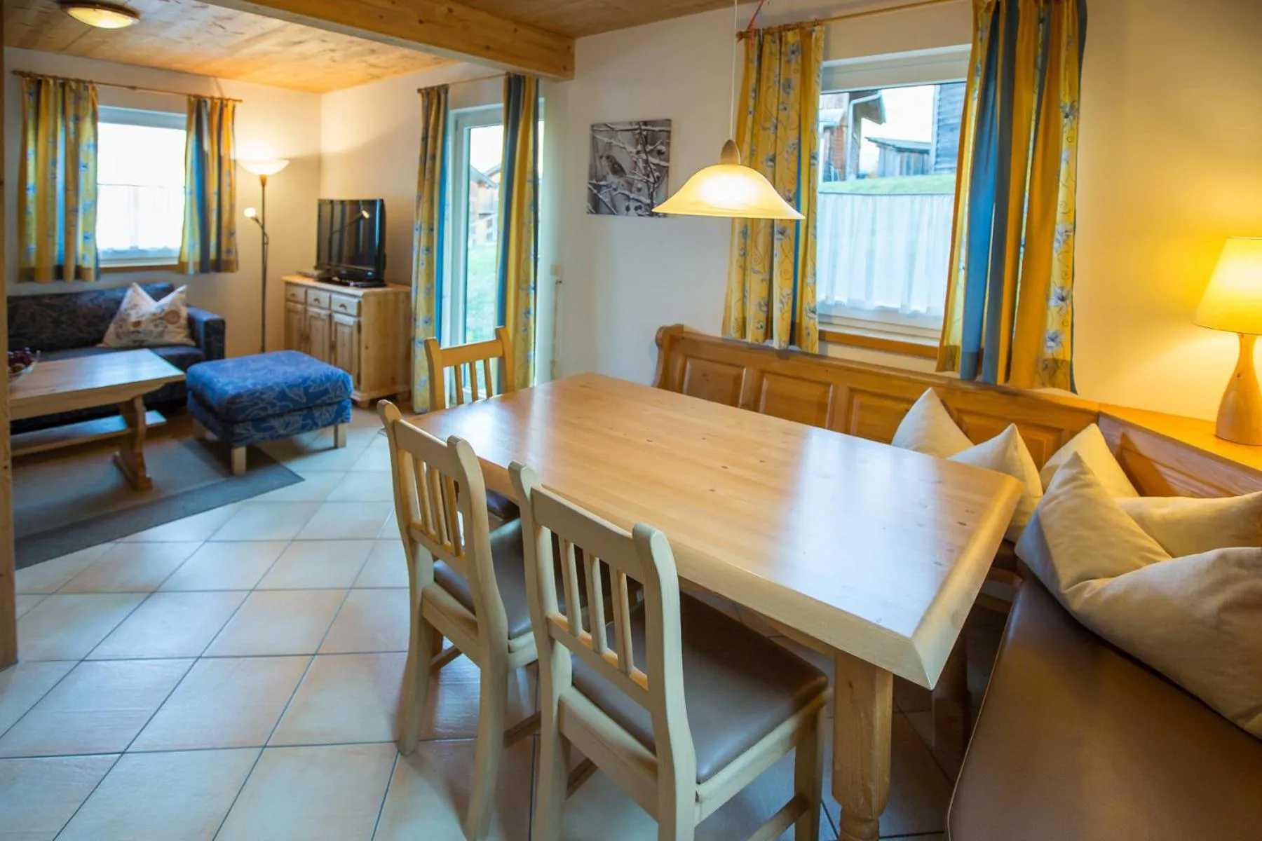 Seating area, Bed in Alpendorf Dachstein West by ALPS RESORTS