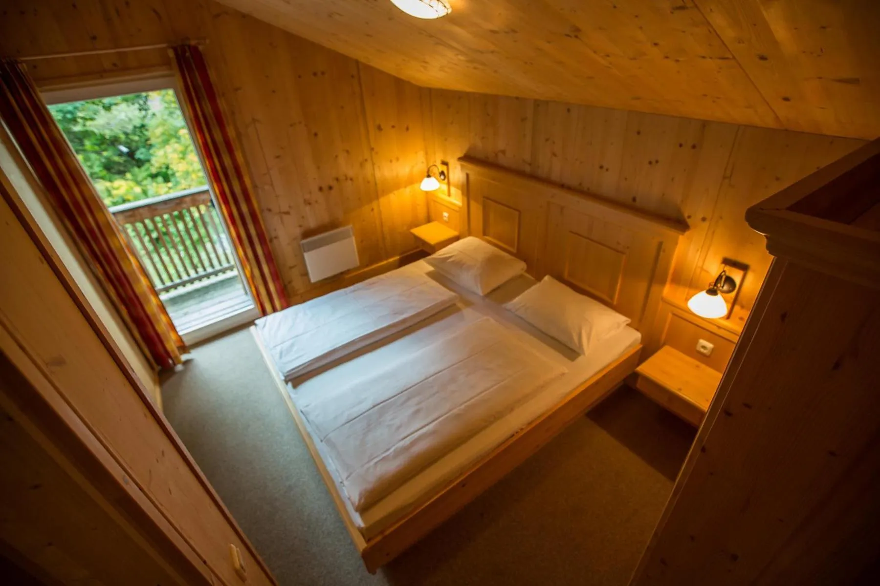 Bedroom, Bed in Alpendorf Dachstein West by ALPS RESORTS