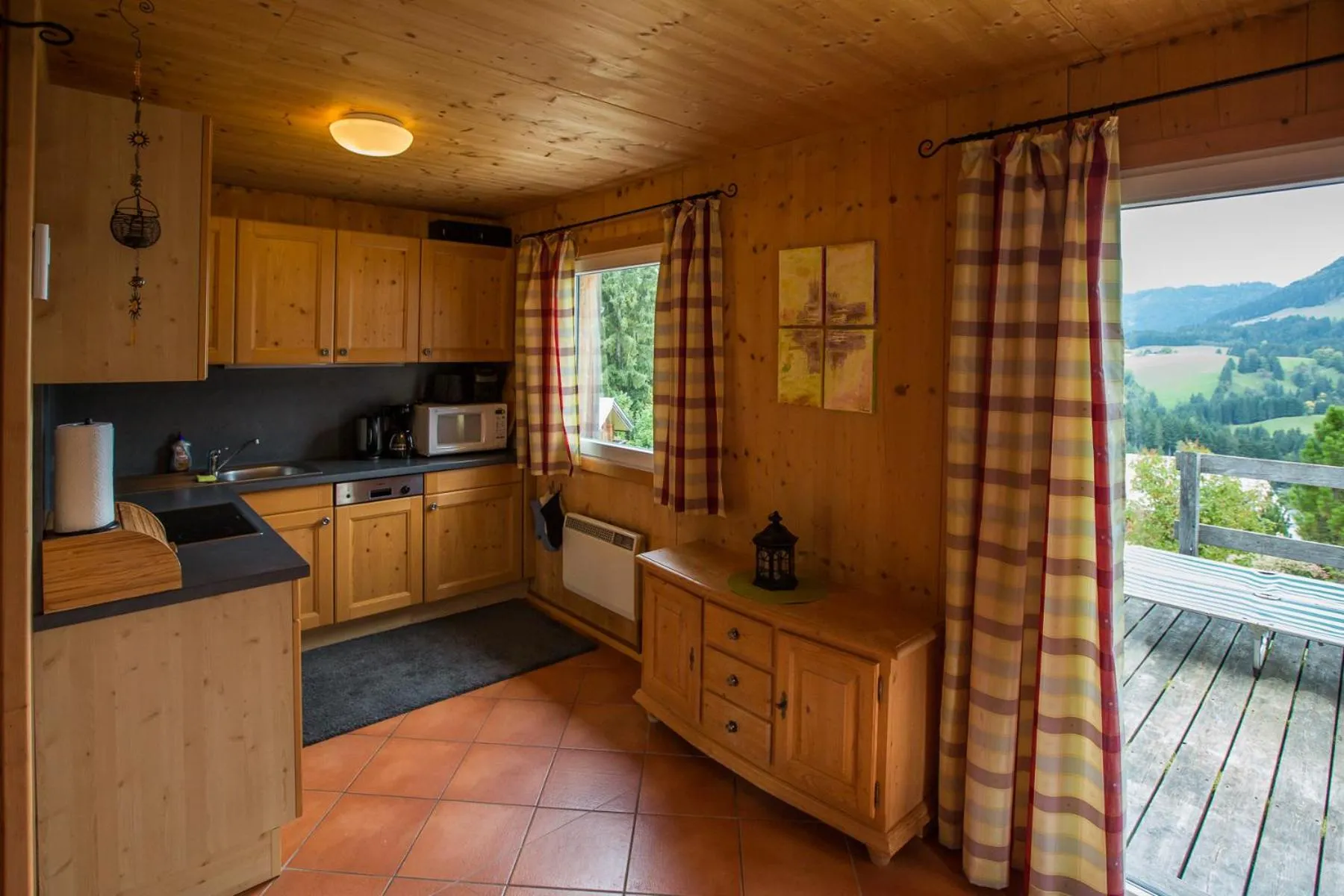 Kitchen or kitchenette in Alpendorf Dachstein West by ALPS RESORTS